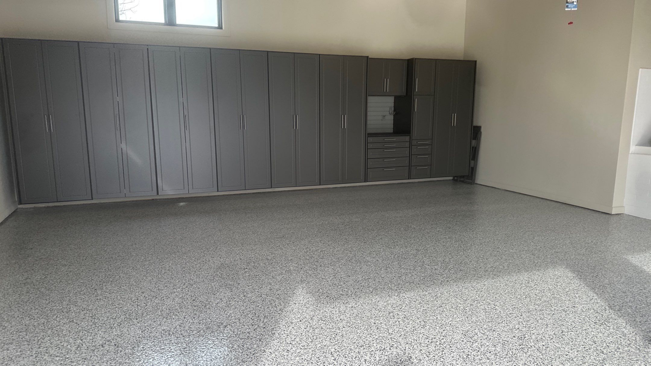 Tim S. added Cabinets and a Banner Garage Floor to his garage by Banner Garage