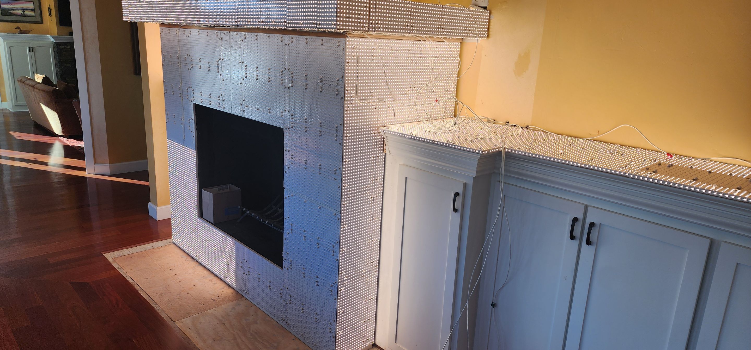 Backlit Stone On A Fireplace by S.Y. Electric Inc.