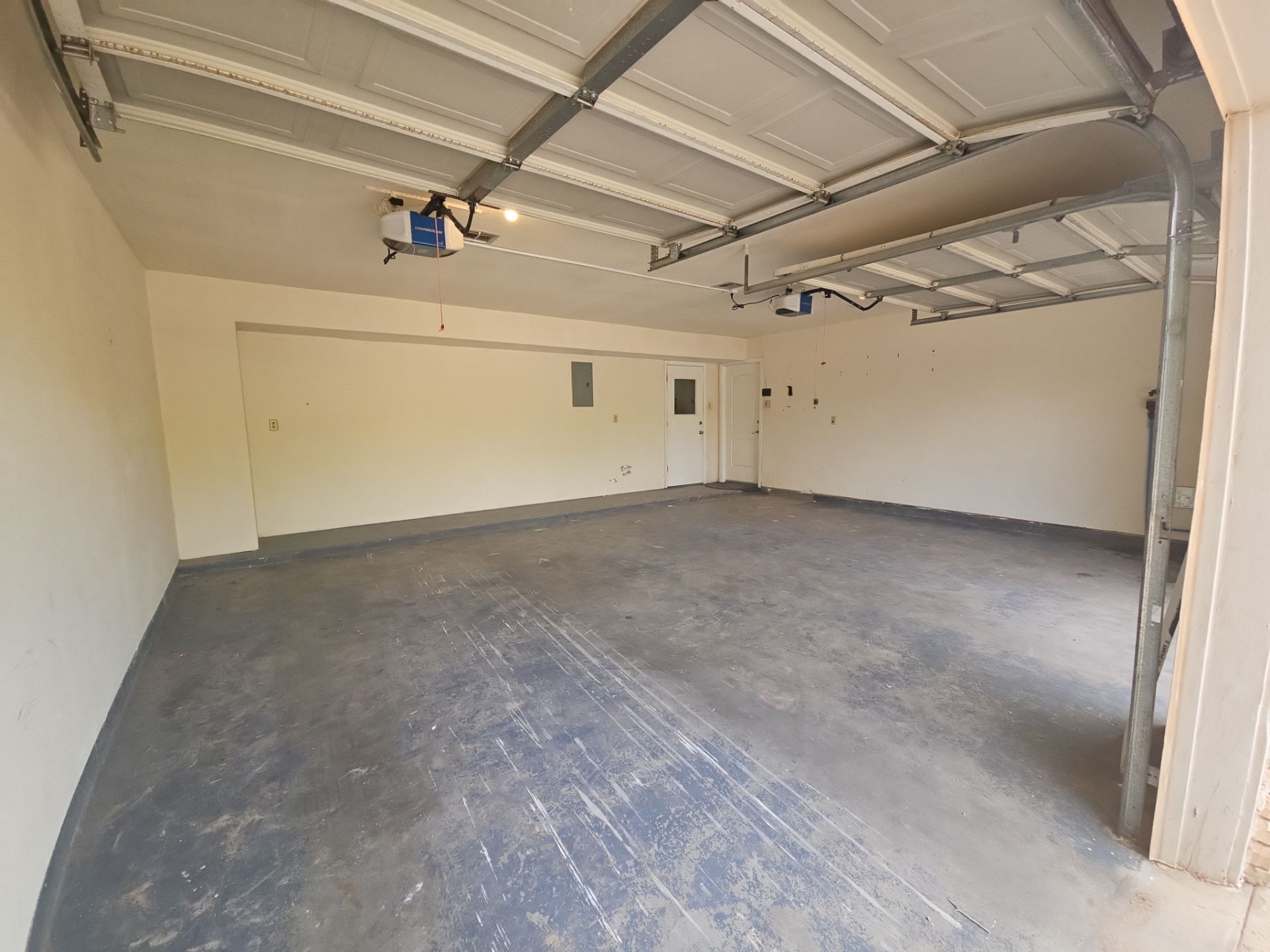 Garage Floor Coating and Crown Moulding Install  by Regal Renovate