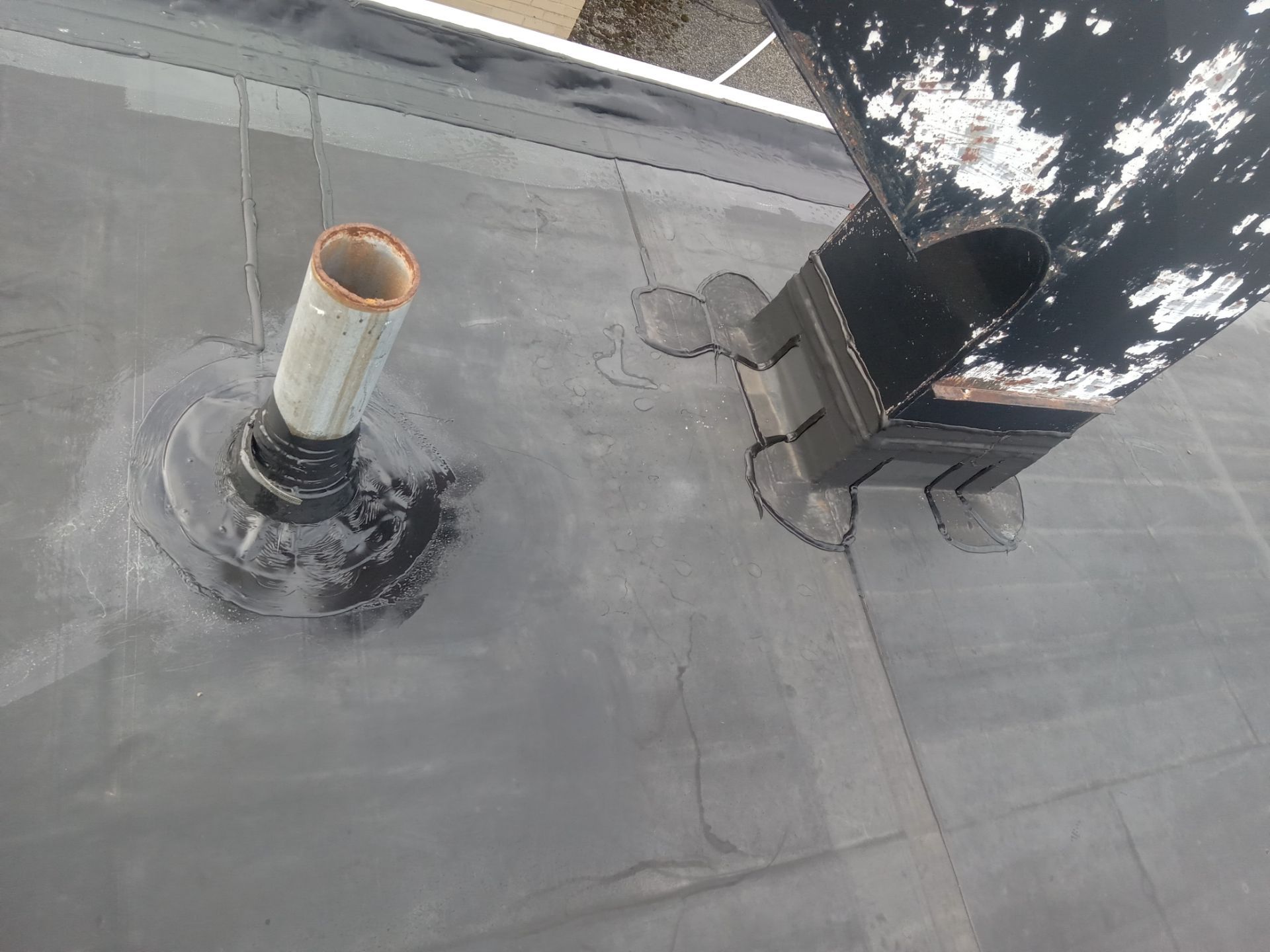 Commercial Roofing using Roof Replacement by Absolute Roofing and Construction