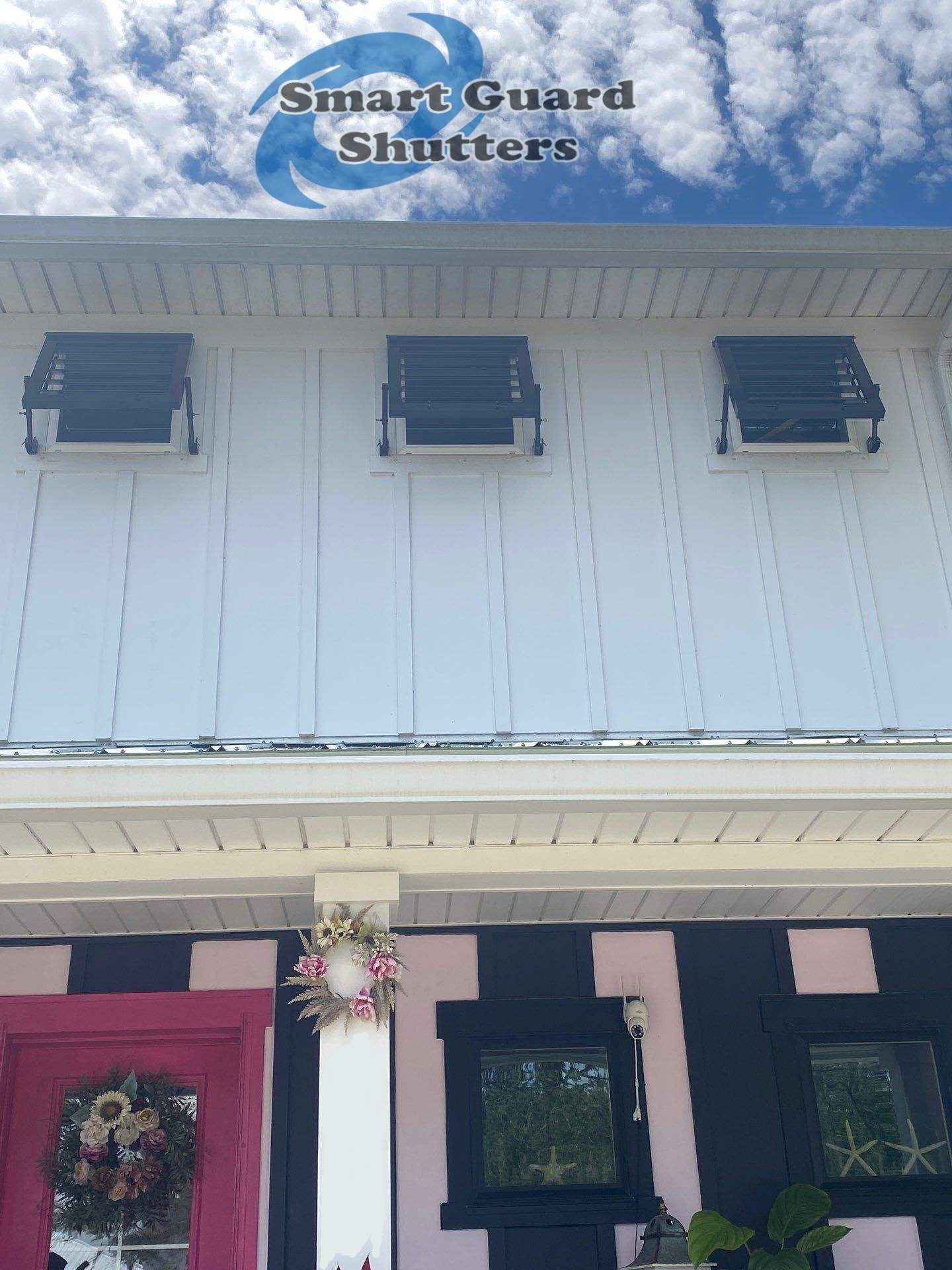 Impact Bahama Shutters in Jet Black by Smart Guard Shutters