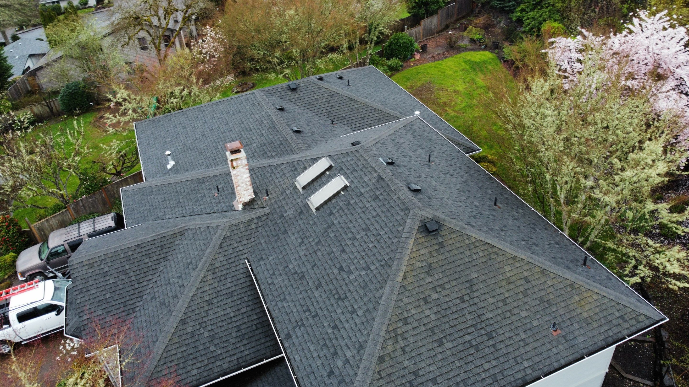 Residential Roofing Installation using IKO Dynasty (Color: Granite Black) by Orezona Building & Roofing Company, Inc.