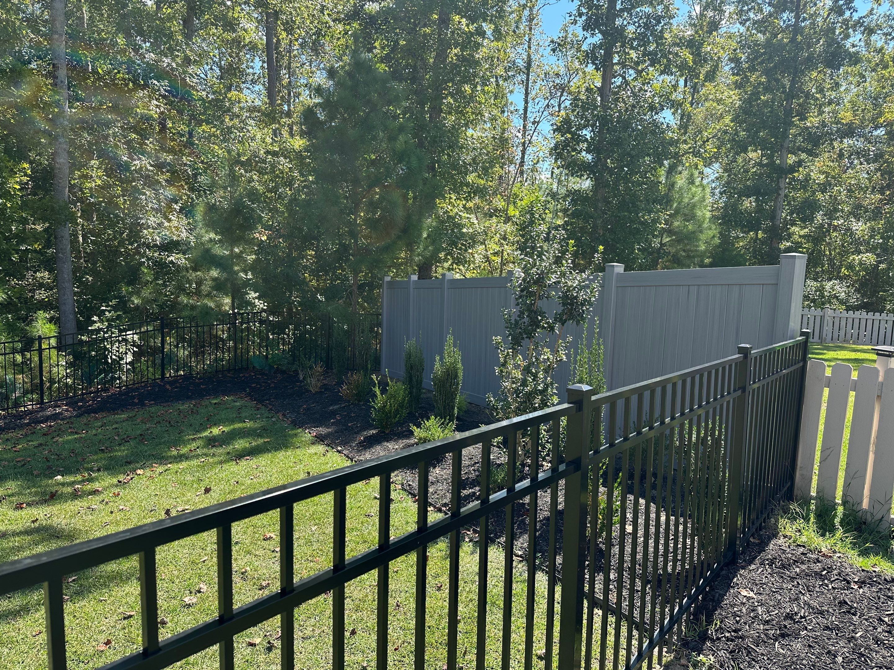 Sterling Aluminum and Gray Hamilton Vinyl Project in New Bern by Superior Fence and Rail