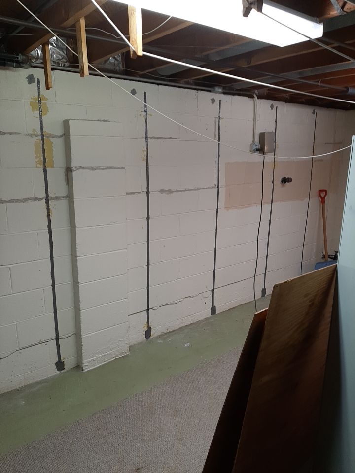 Wall Straightening and Reinforcement using Embedded Fiber Reinforcement by Toledo Basement Repair 