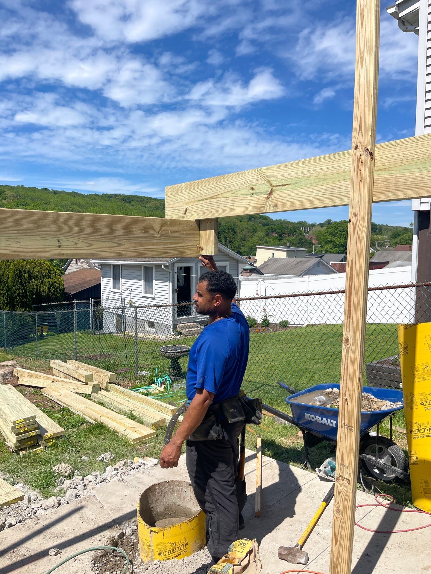 Pressure-Treated Wooden Staircase and Concrete Footing Installation in Schuylkill Haven by Herts Roofing & Construction
