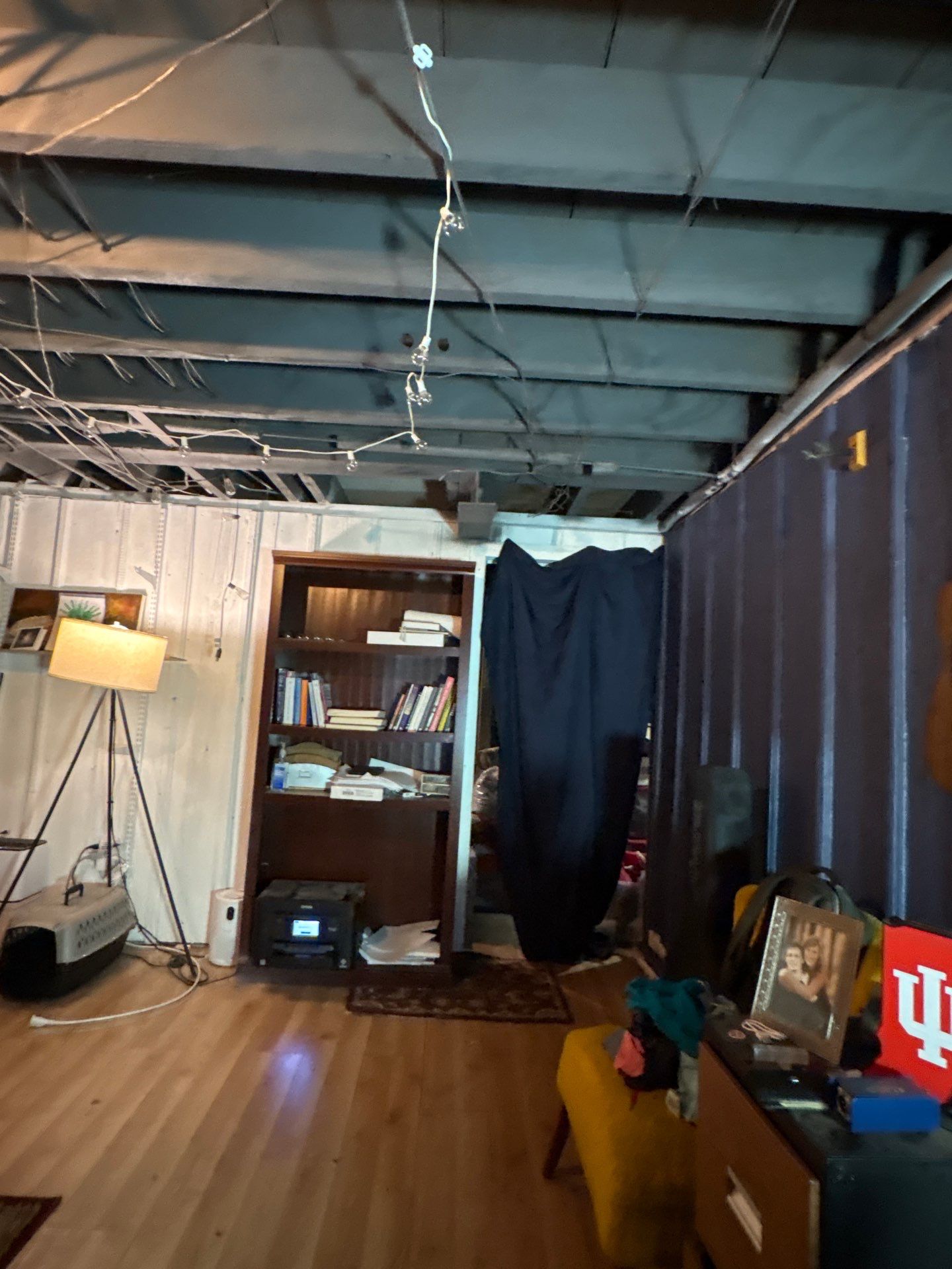 Wanamingo Basement Renovation with Exposed Ceilings and Wood Paneling by CompanyCam Sales Demo