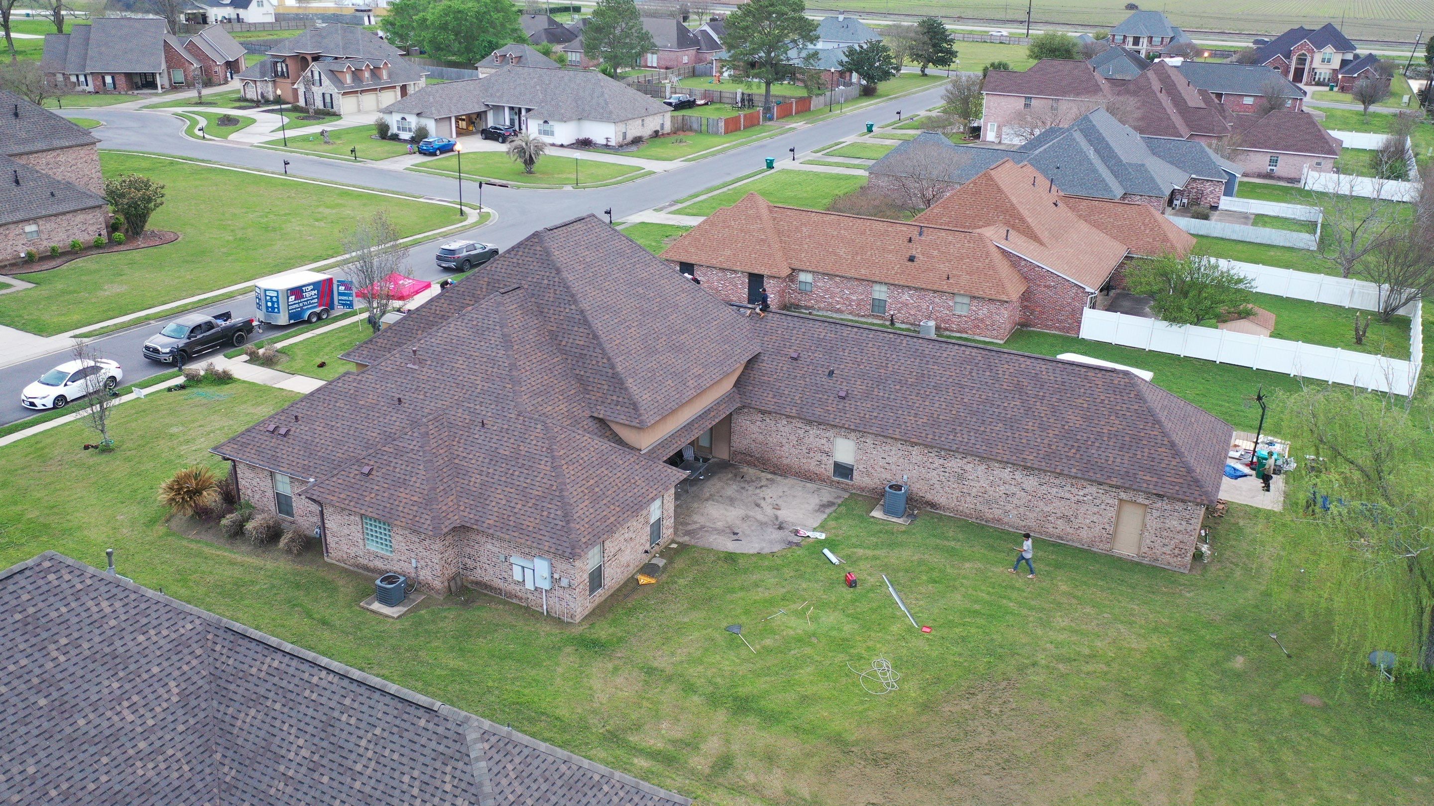 Top Team Roofing & Construction featured photo.