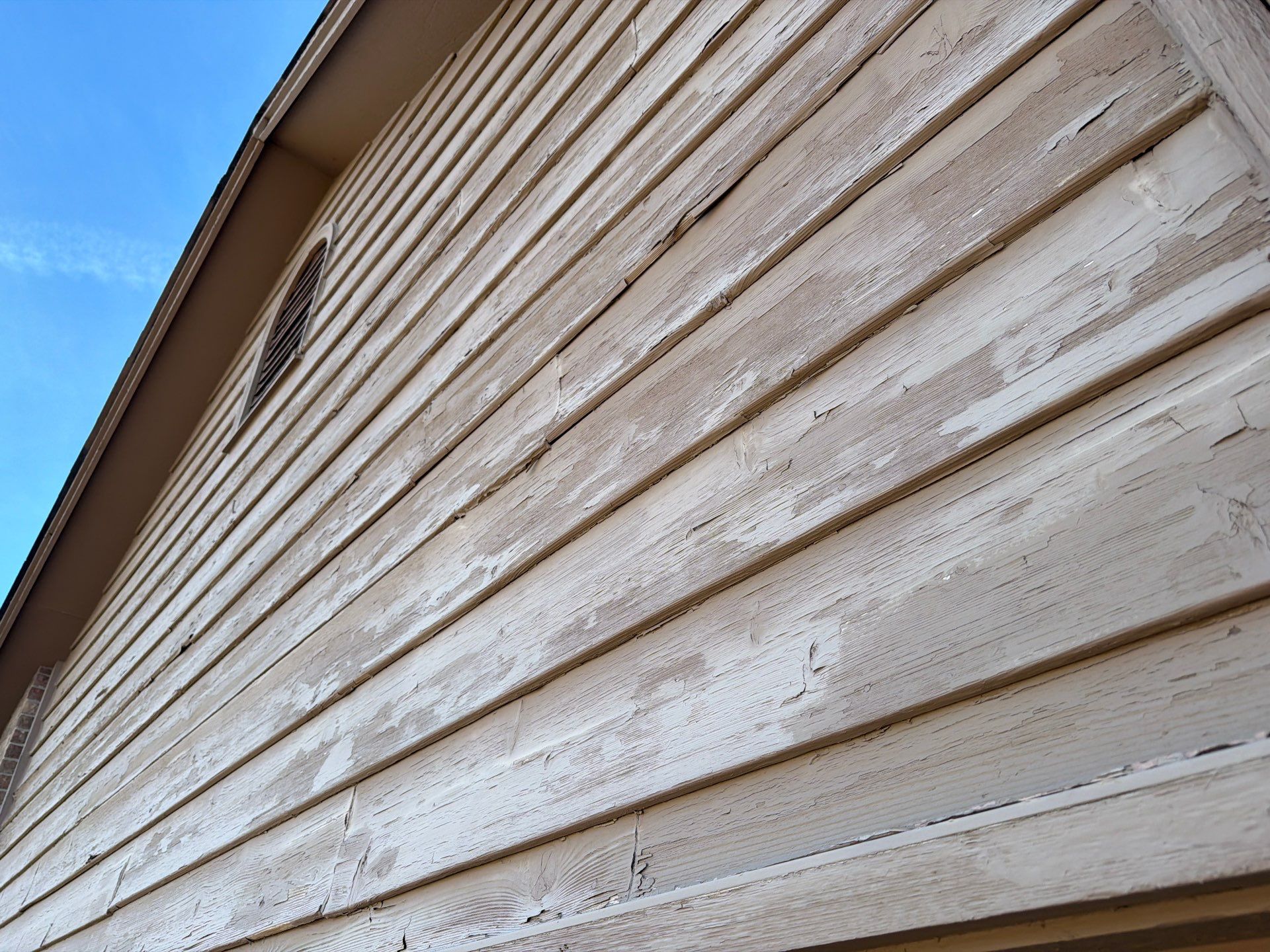 Wood Siding Restoration and Exterior Painting in Sioux Falls by Select Painting, Coatings & Garage Cabinets