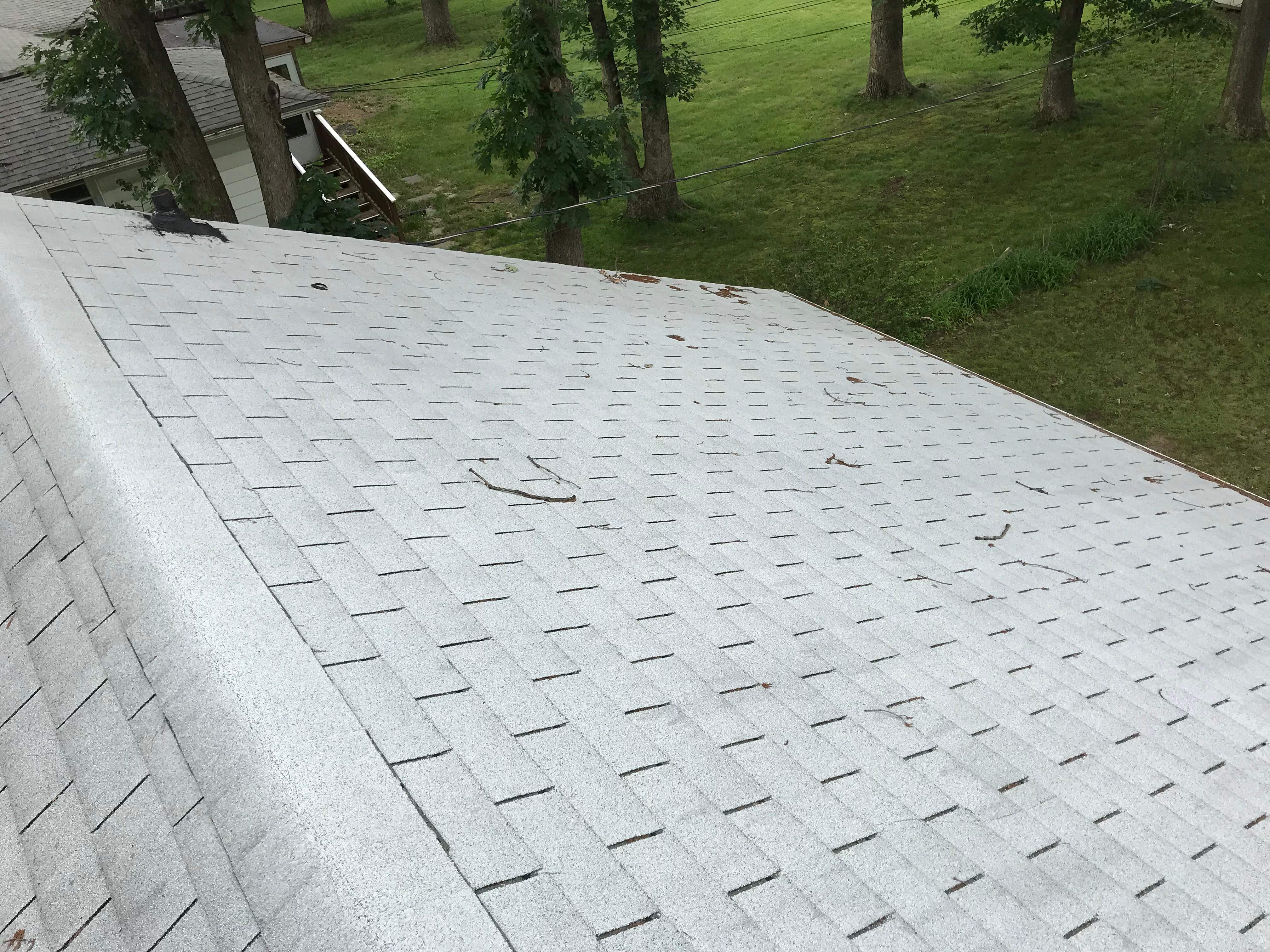Residential Roofing Installation using Charcoal Black by Alpha Design Services