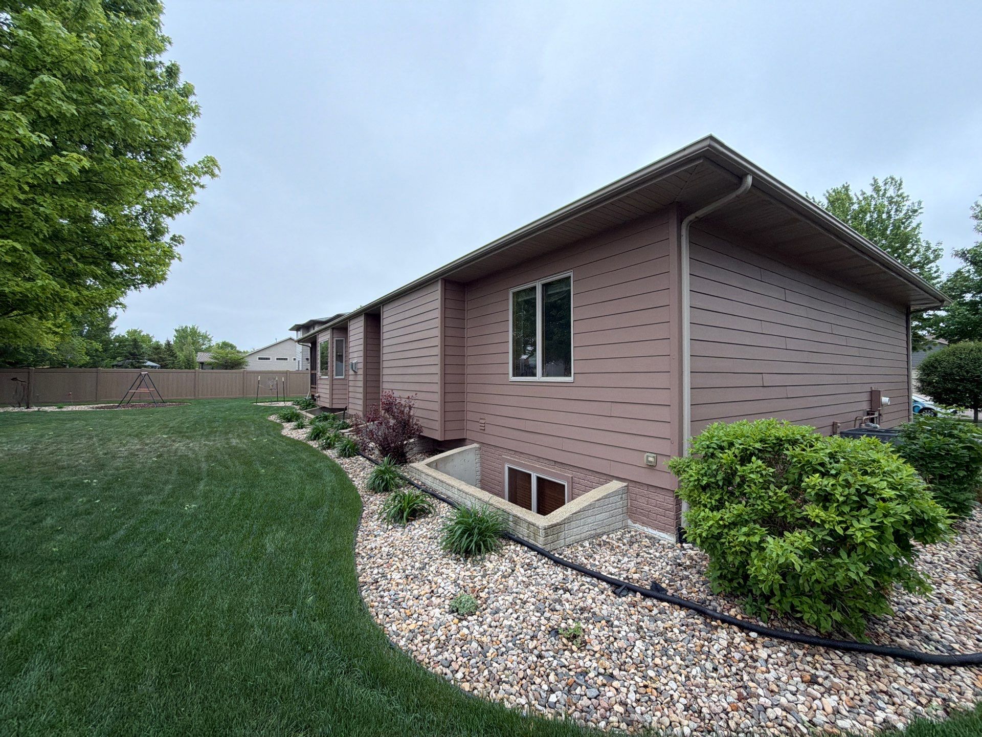 Exterior Painting and Wooden Deck Staining in Sioux Falls by Select Painting, Coatings & Garage Cabinets
