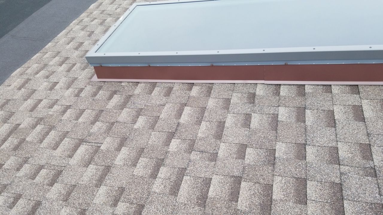 Skylight removal and install  by Absolute Roofing and Construction