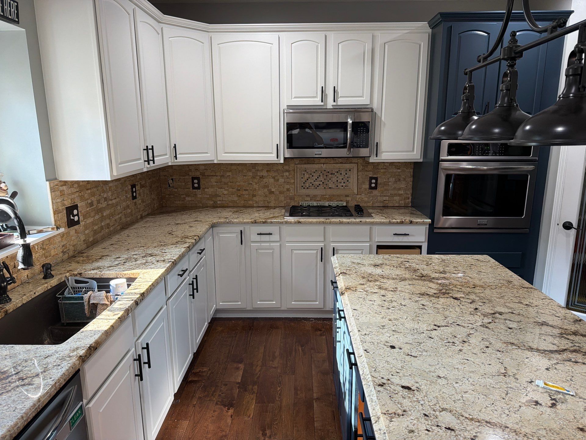 Kitchen Cabinet Refinishing by Top Shelf Painter