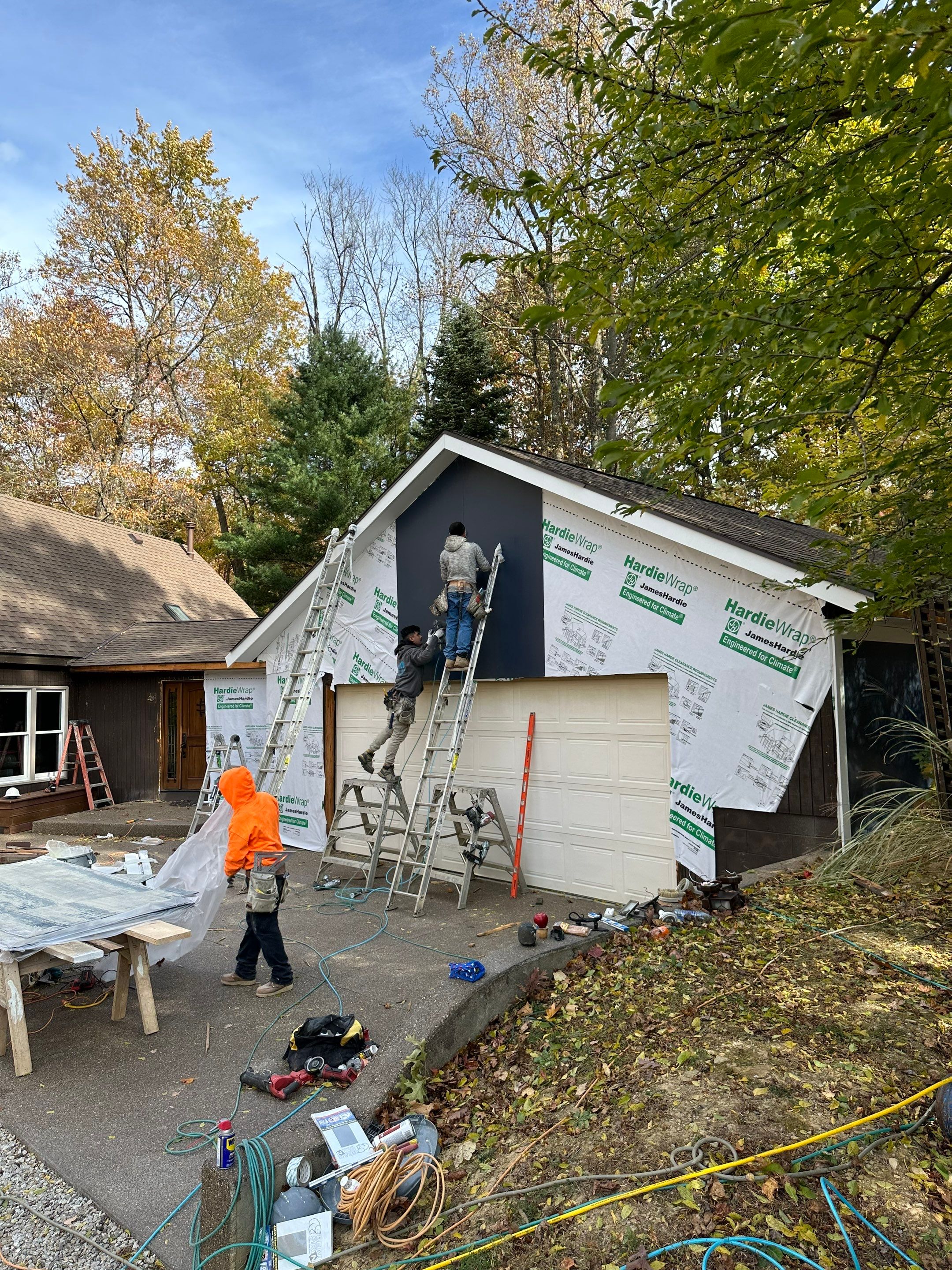 Siding Installation using James Hardie Board & Batten Siding by Best Roofing & Siding Company