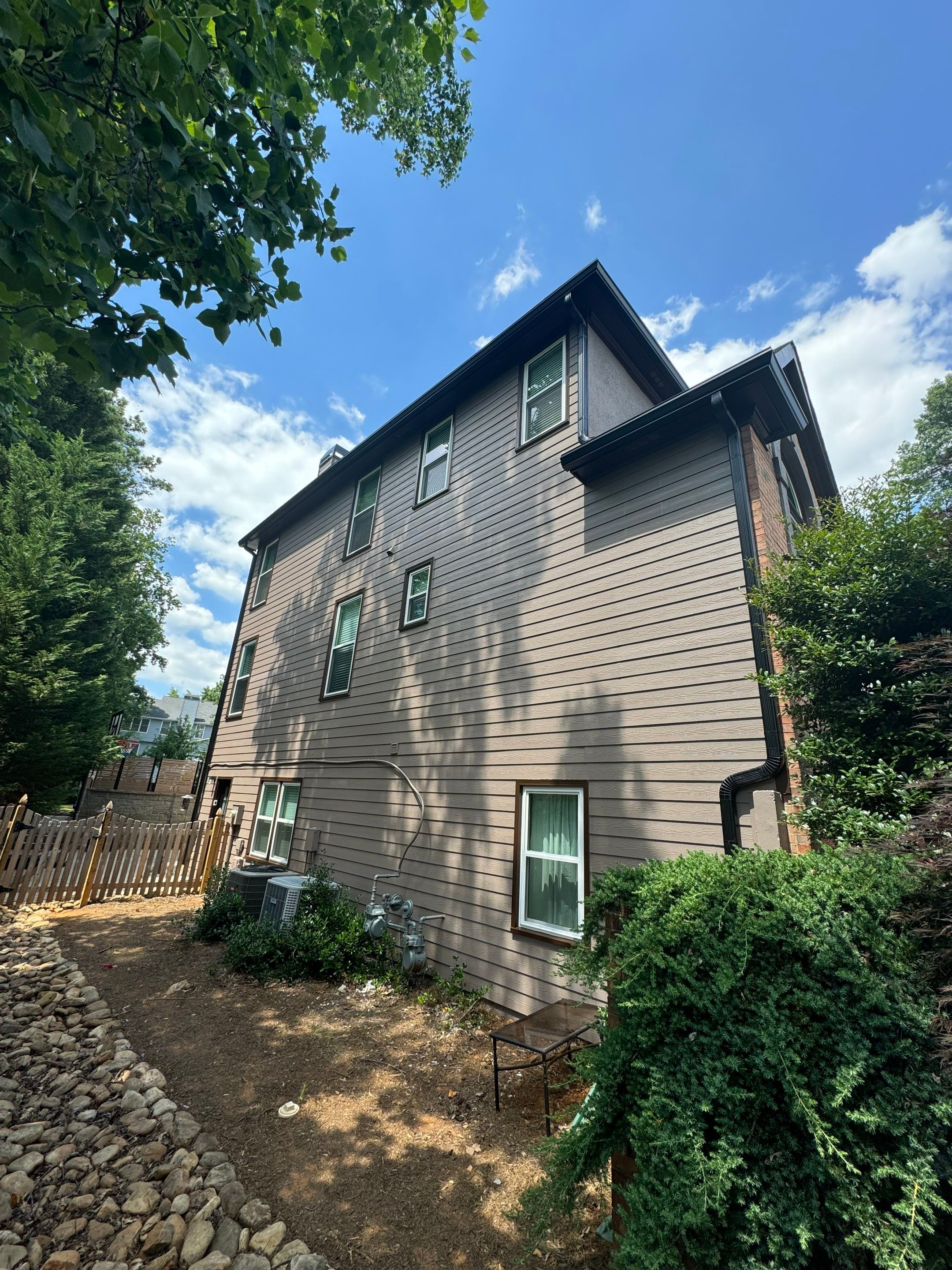 Full Exterior Painting and Gutter Replacement for Powder Springs Home by Swift Home Renovations