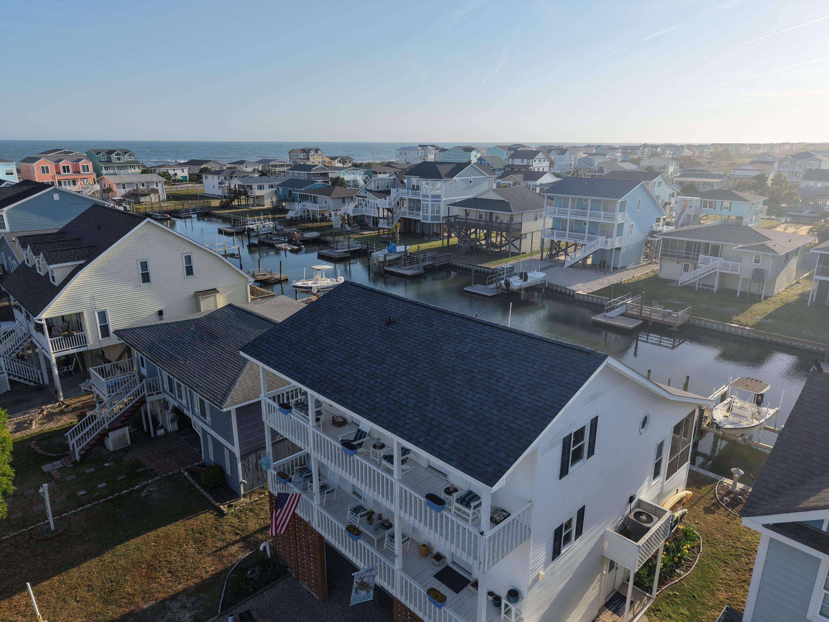 Holden Beach Canal-Side FORTIFIED Roof Replacement with Coastal Blue Shingles by RGR Construction and Roofing, LLC