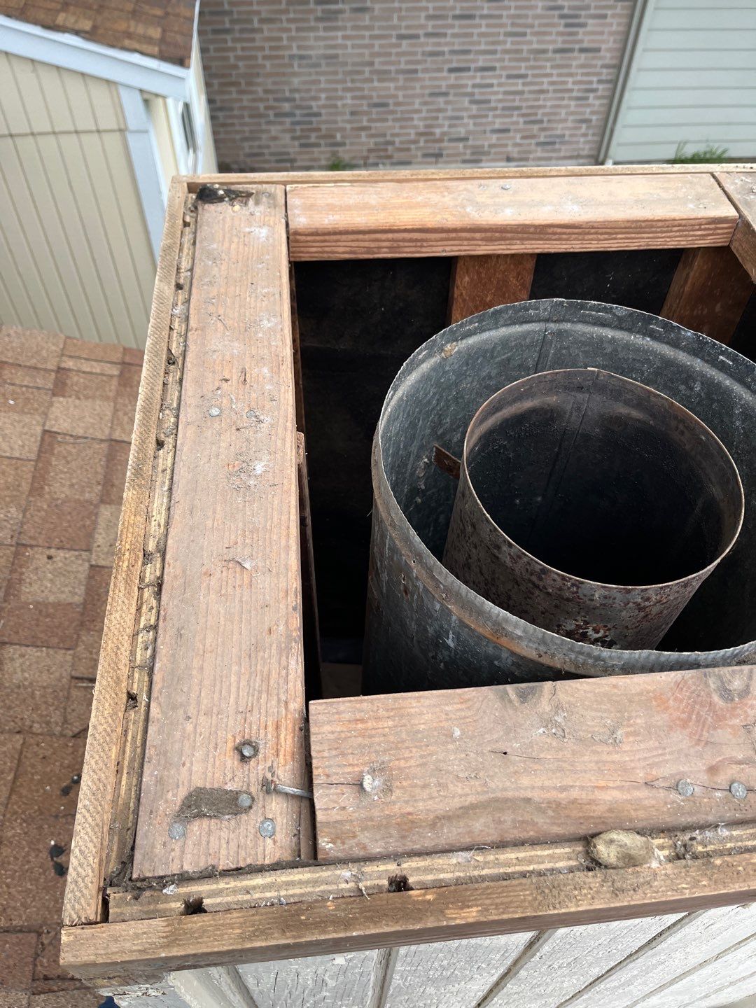 Chimney Cap Replacement using Custom Fabricated Steel by Lighthouse Roofing