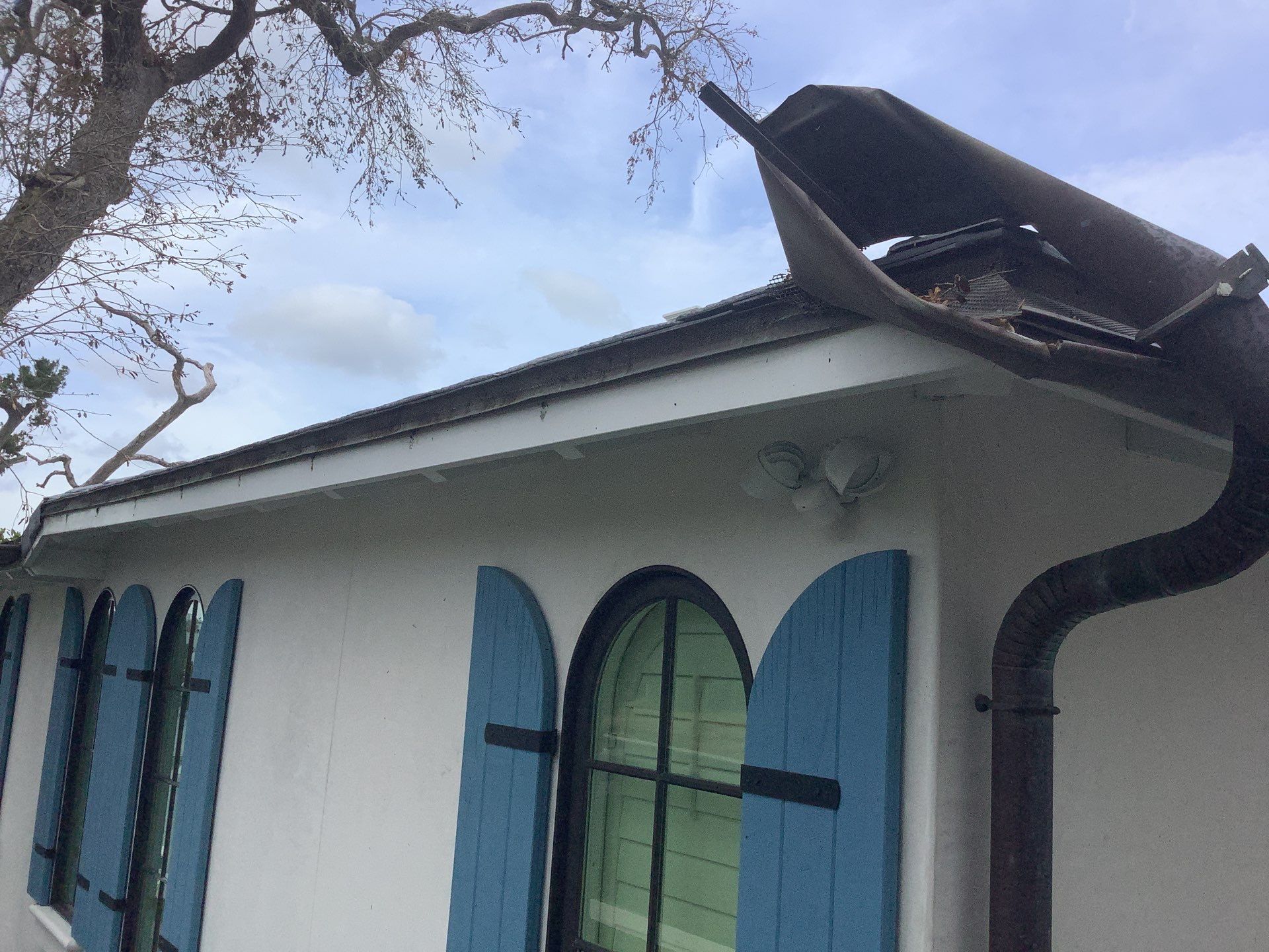 Gutter Cleaning using gutter cleaning in Sarasota FL by Gutter Professors