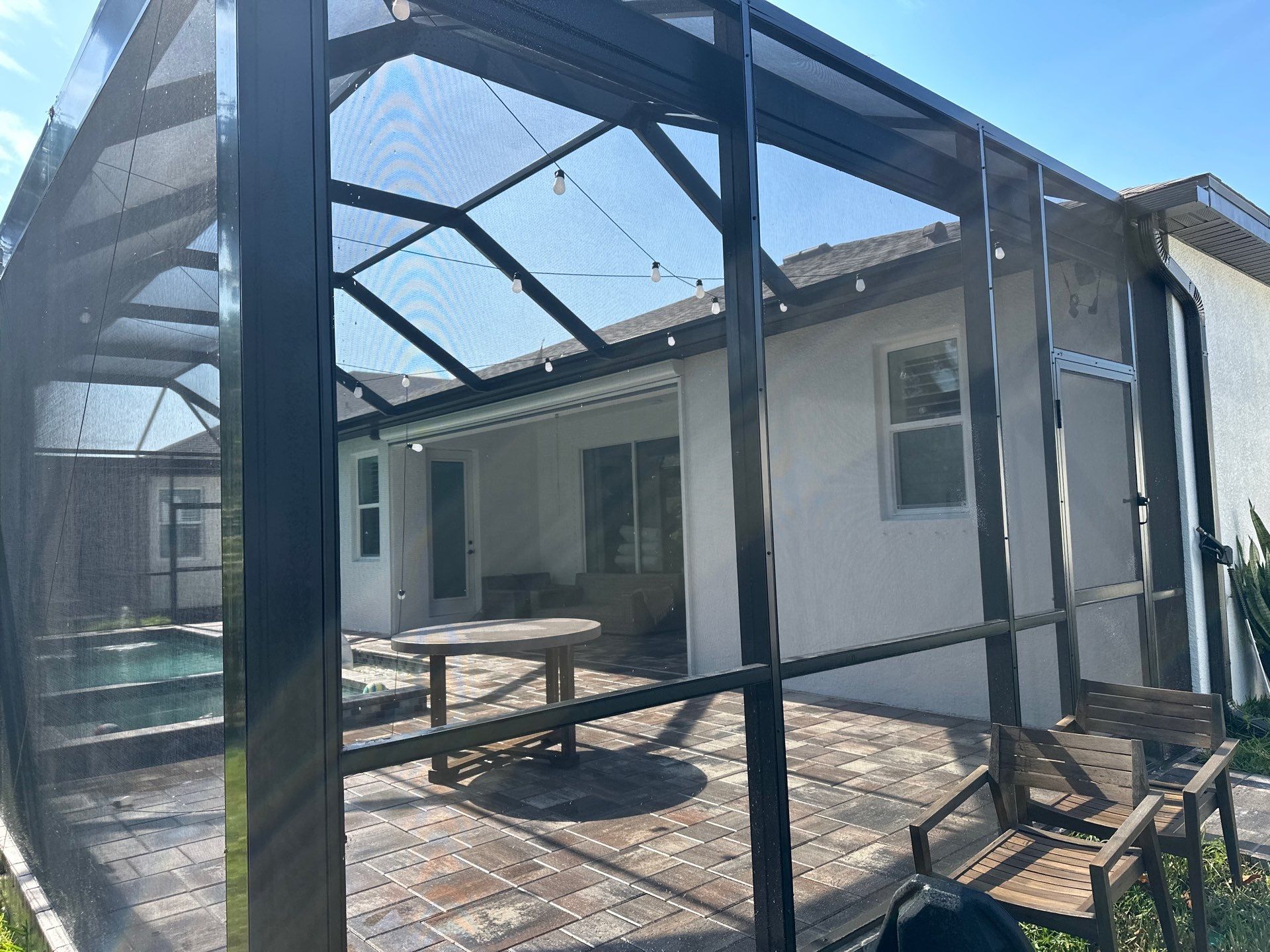 Screen Enclosure & Paver Pool Deck Cleaning in Trevesta Community, Palmetto, FL | Sunshine AquaWash by Sunshine AquaWash