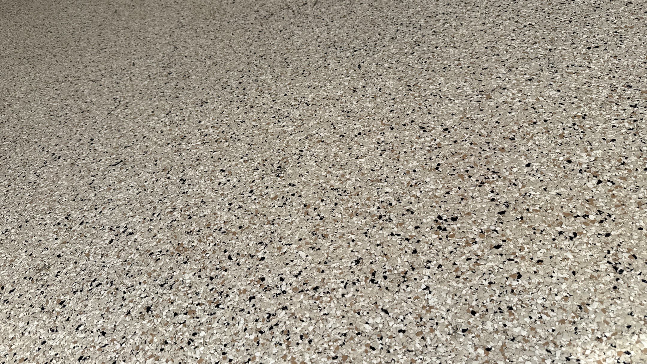 Raymore Garage Finishing With Custom Epoxy Floor Coating by Banner Garage