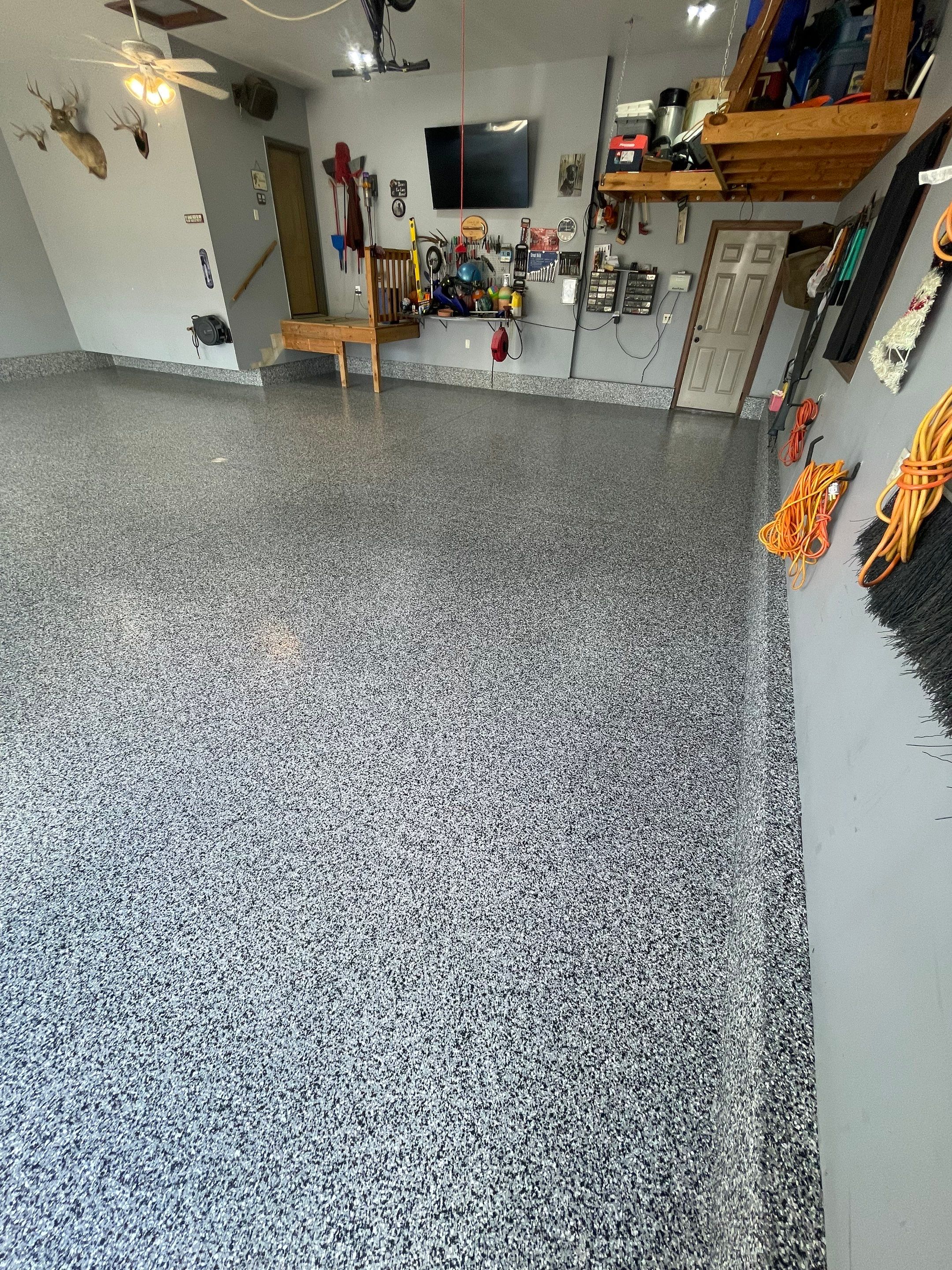 Residential Garage Floor Coating in Sioux Falls by Select Painting, Coatings & Garage Cabinets