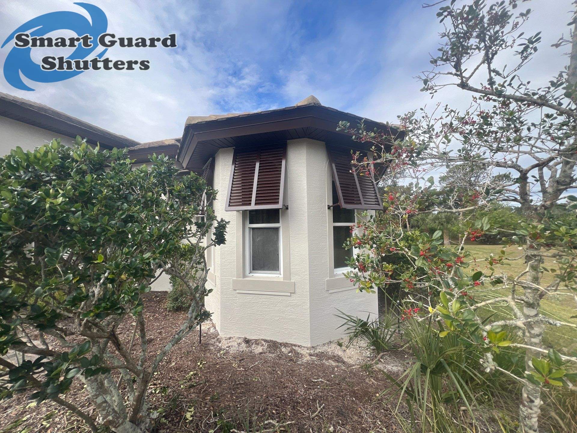 Decorative Bahama Shutters in Chocolate Brown by Smart Guard Shutters