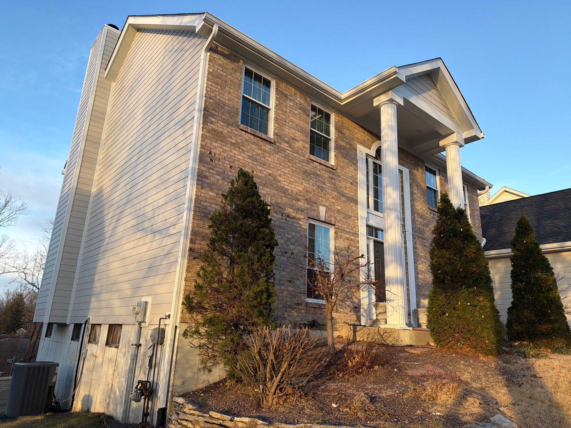 Full James Hardie Siding and Gutter Replacement in St. Louis by Acute Roofing And Exteriors 