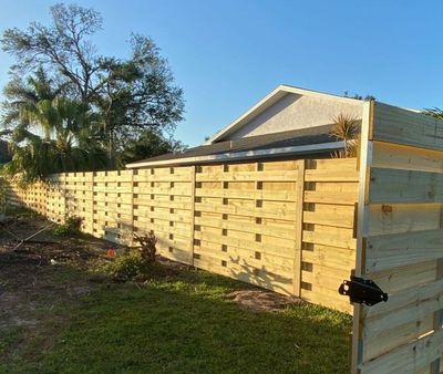 Wood Fence Installation using Shadowbox Wood Fence