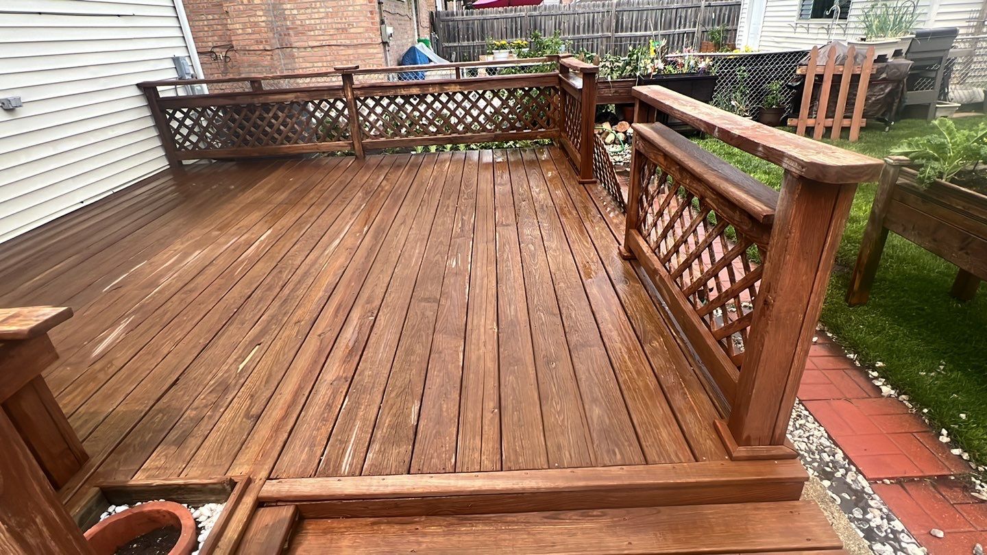 Wood cleaning and staining using Armstrong cloark oil stain by Northern Power Washing LLC.