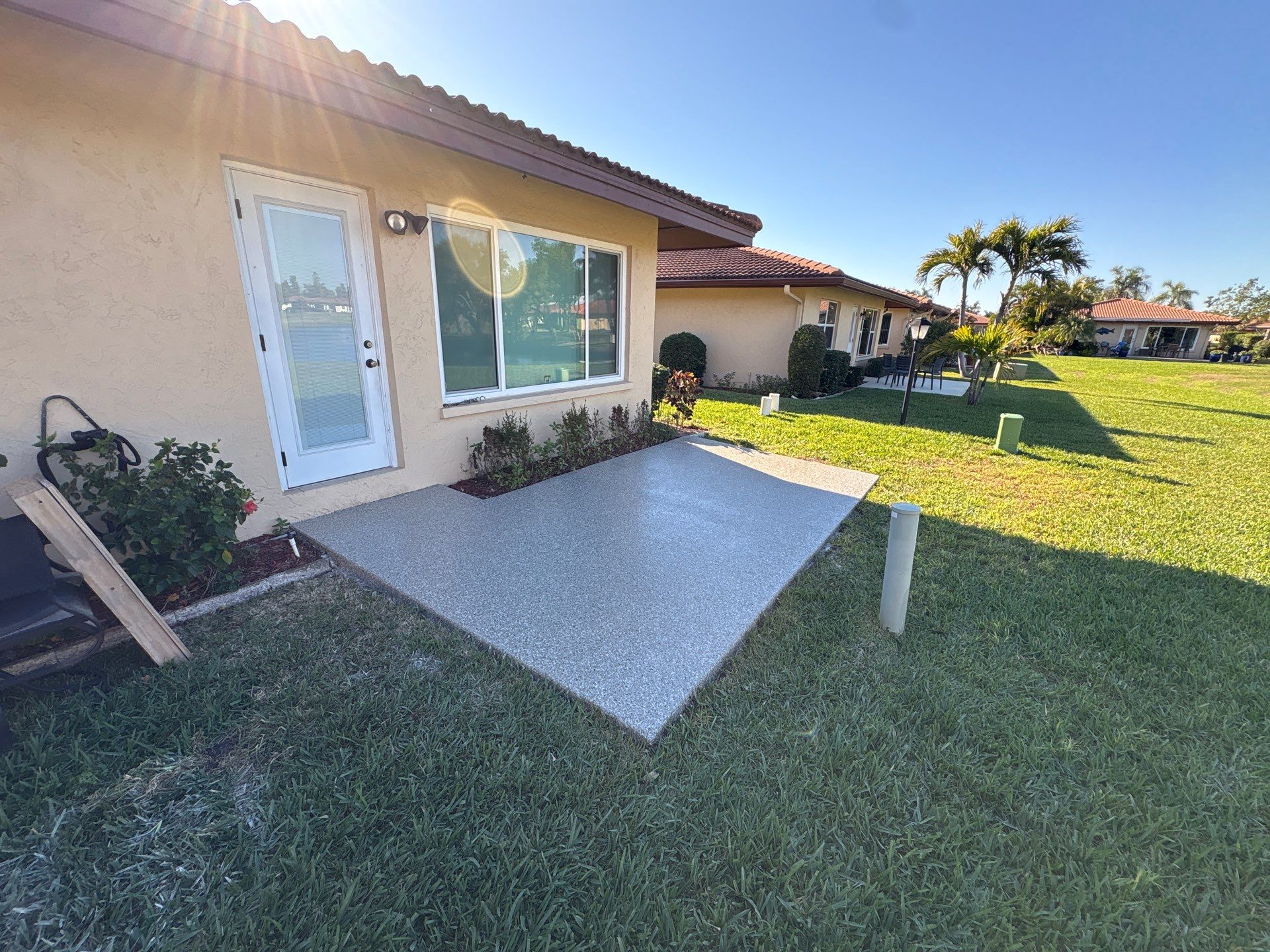 Bradenton, FL Driveway and Patio Epoxy Combination by Performance Floors & Coating