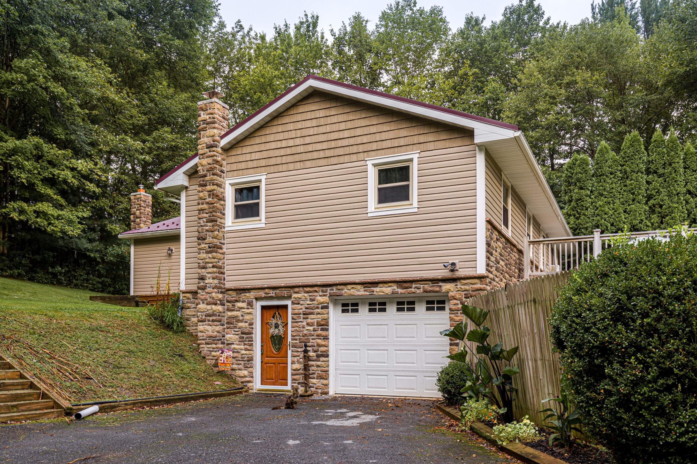 Vinyl Siding- by Esh Builders