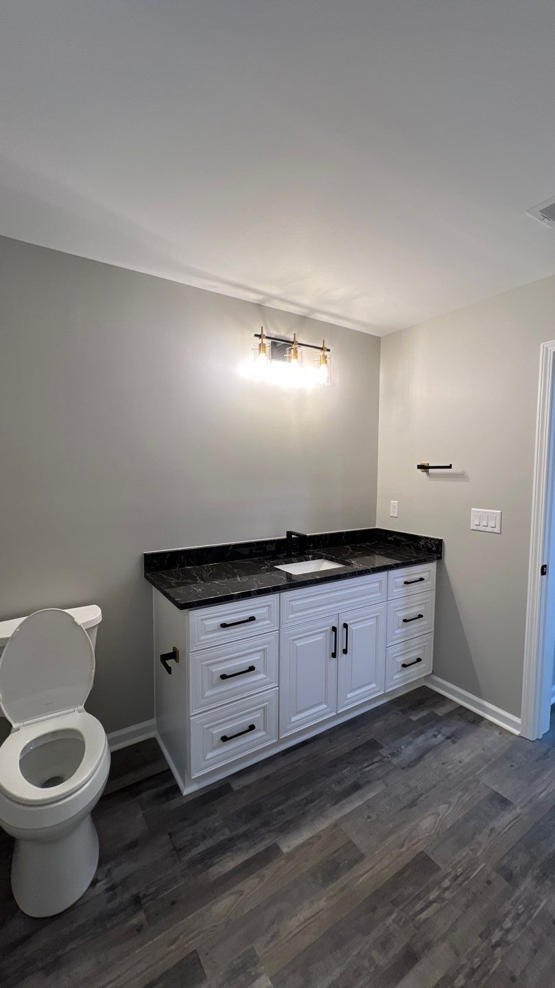 Modern Basement Finishing Project in Acworth Featuring Custom Wet Bar by Swift Home Renovations