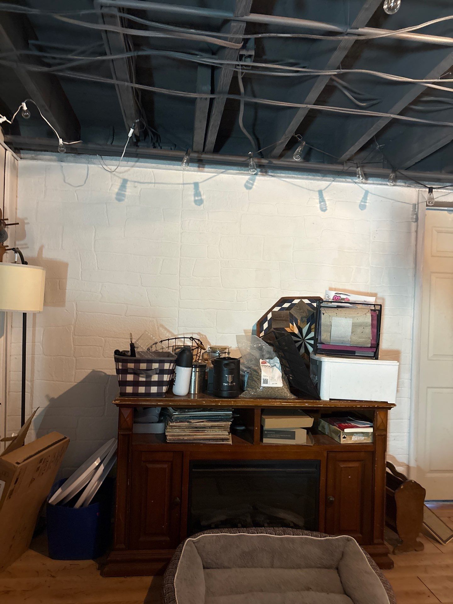 Wanamingo Basement Renovation with Exposed Ceilings and Wood Paneling by CompanyCam Sales Demo