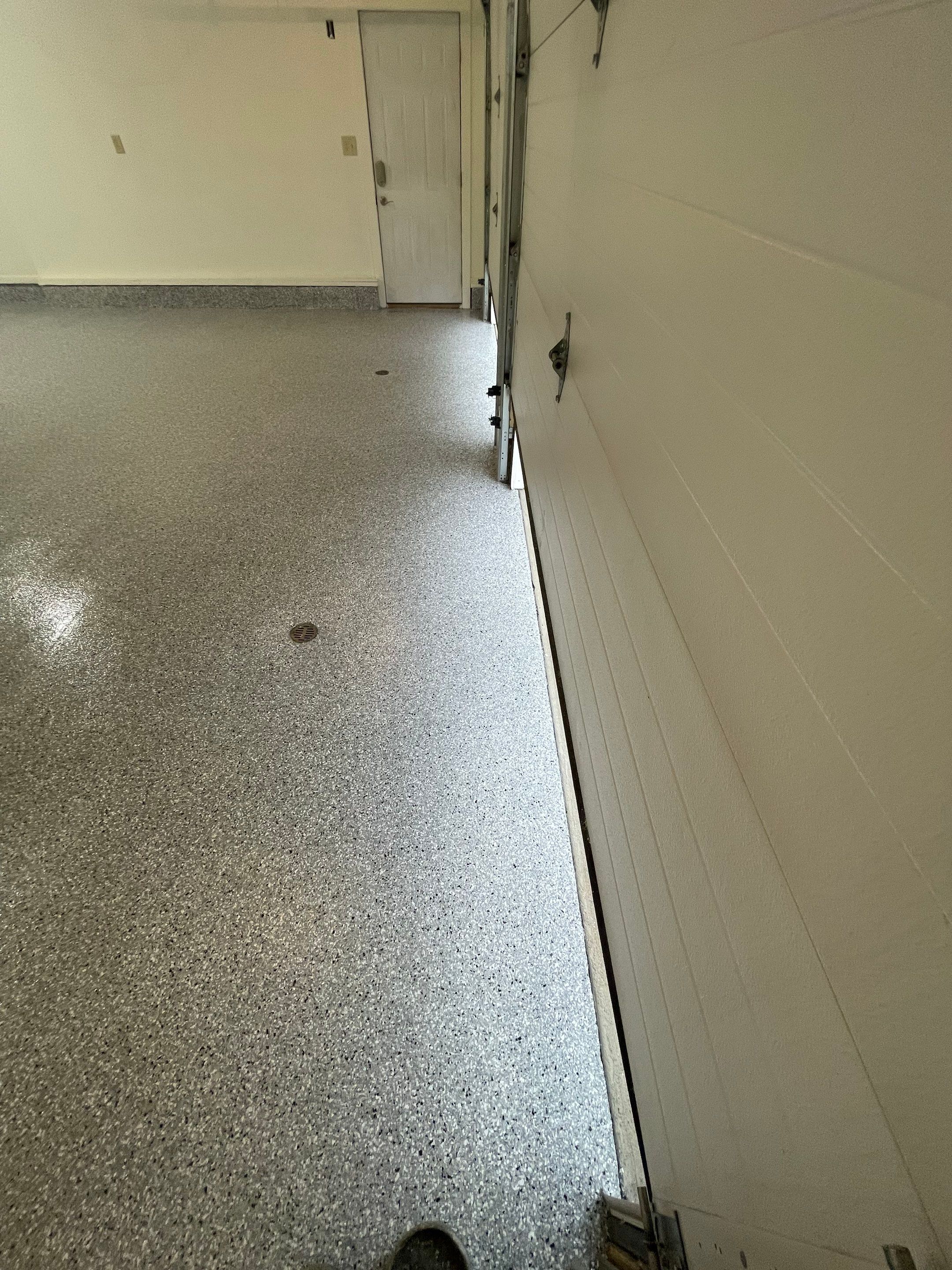 Madison Garage Concrete Coating with Feather Grey Speckle Finish by Select Painting, Coatings & Garage Cabinets