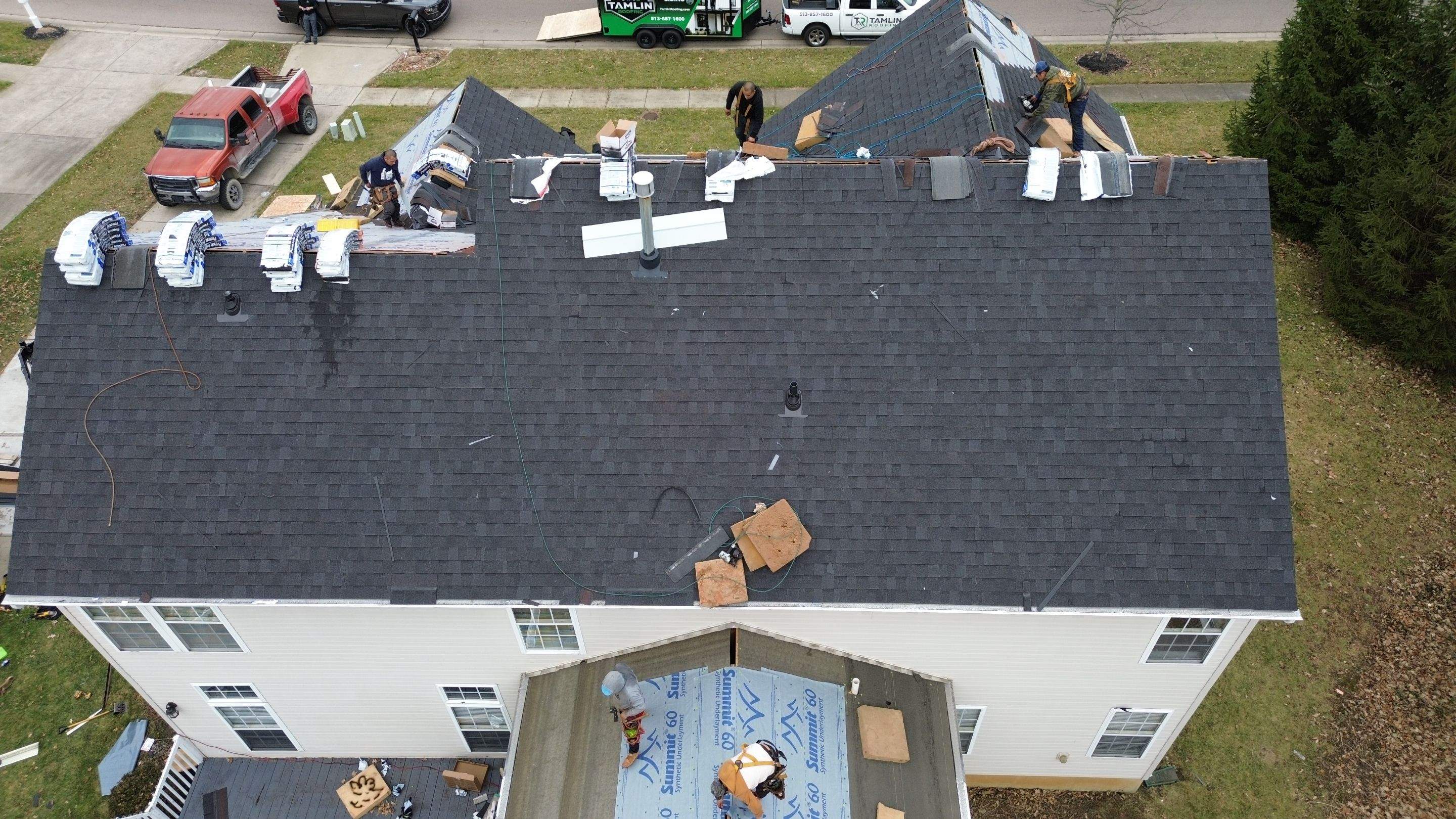 Walden Ponds - Pristine Black and Hydro Flo Gutter Guards by Tamlin Roofing