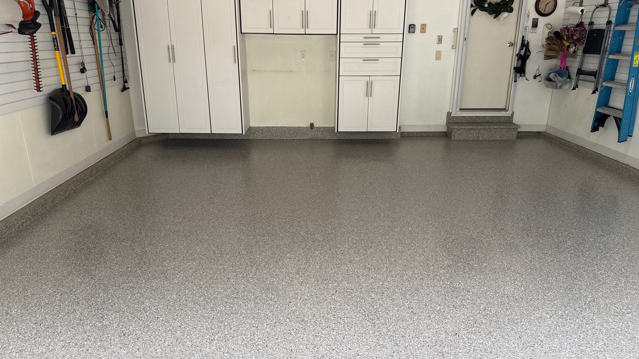 Rachelle & Norman Have a Beautiful New Floor  by Banner Garage