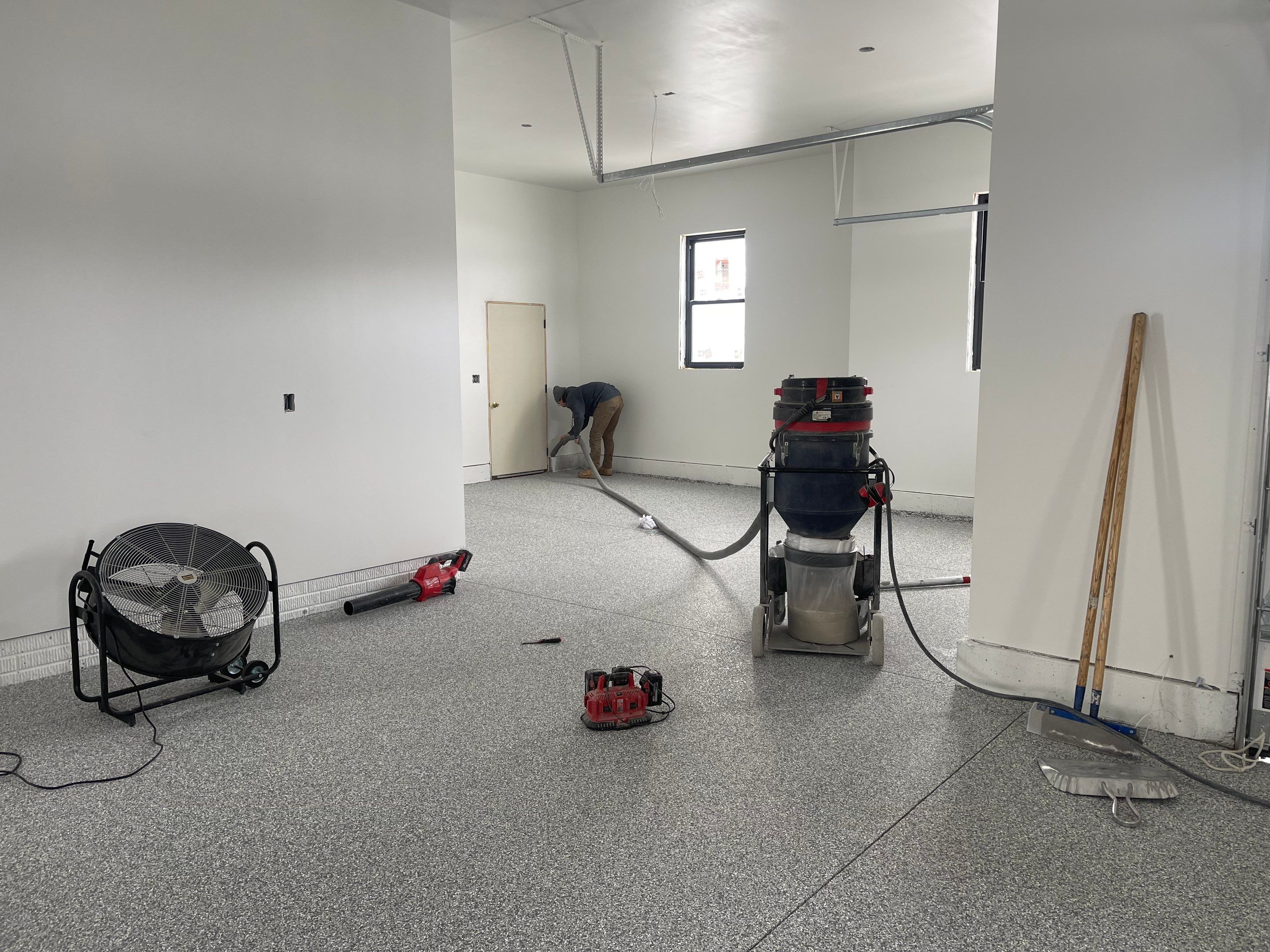 Garage using Slate Stone by Select Painting, Coatings & Garage Cabinets