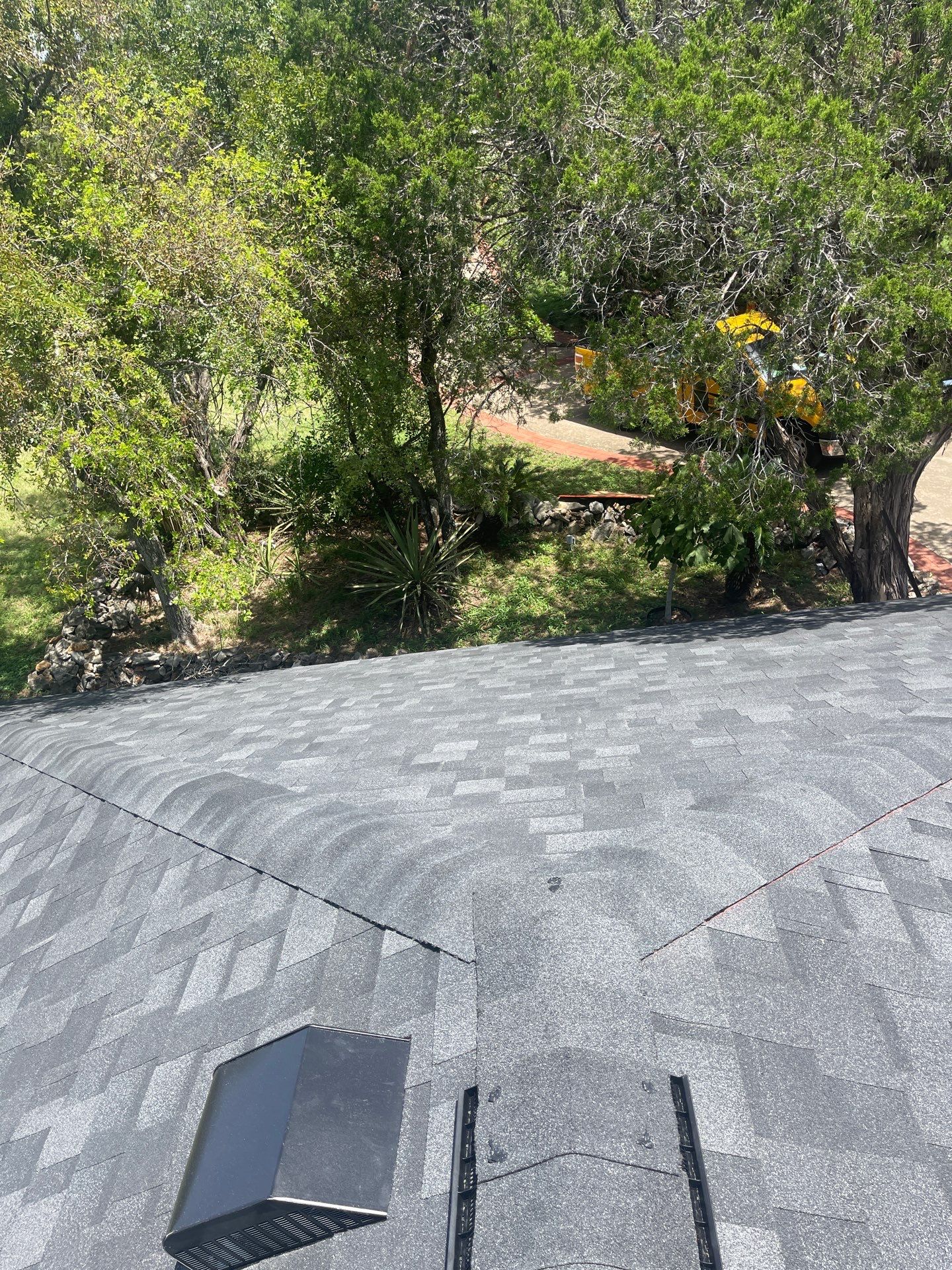 Residential Roofing Installation using IKO Nordic Granite Black by DeZign Roofing & Exteriors