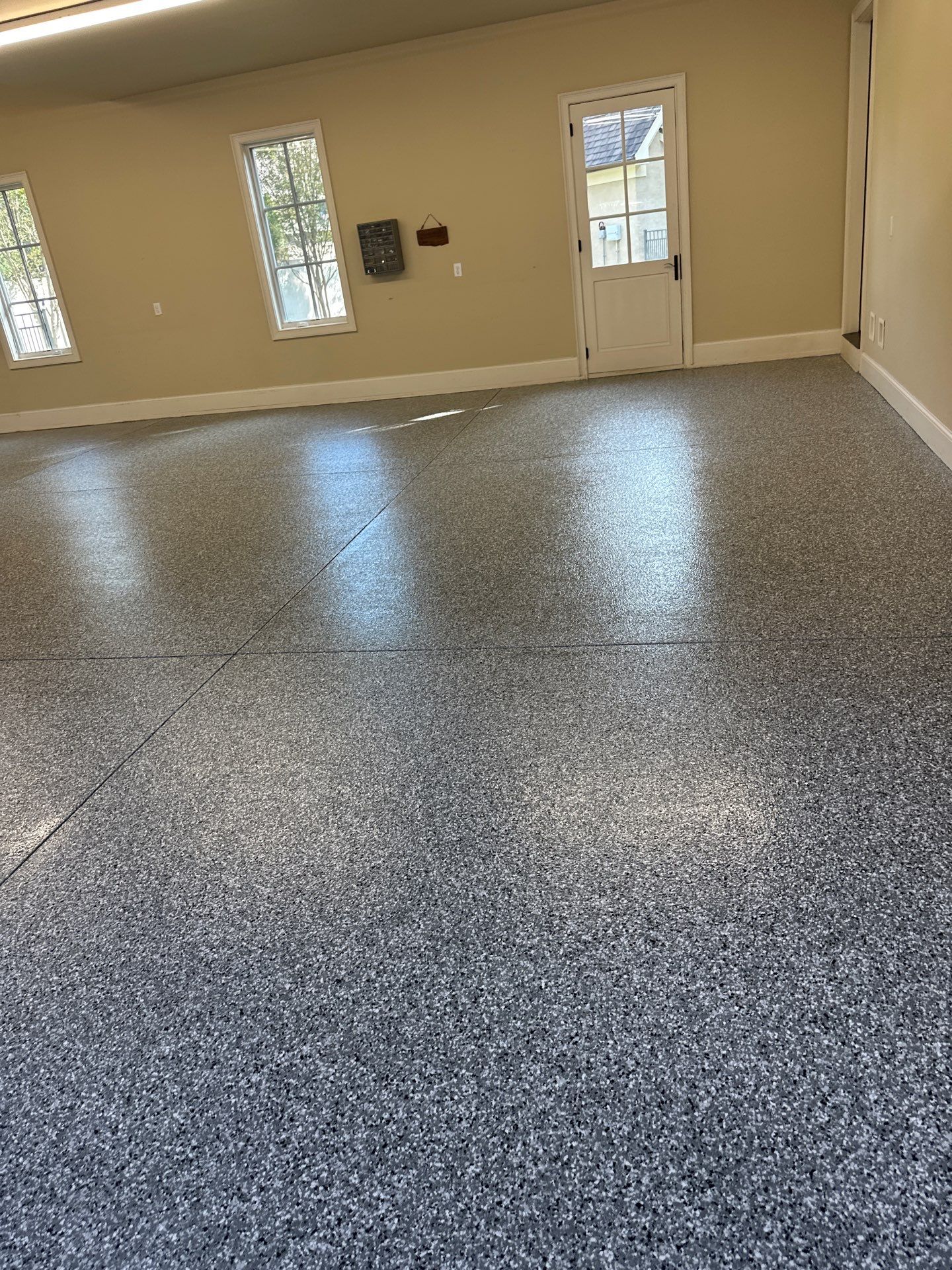 Garage Floor Coating using Wombat by My Garage Floor Guys
