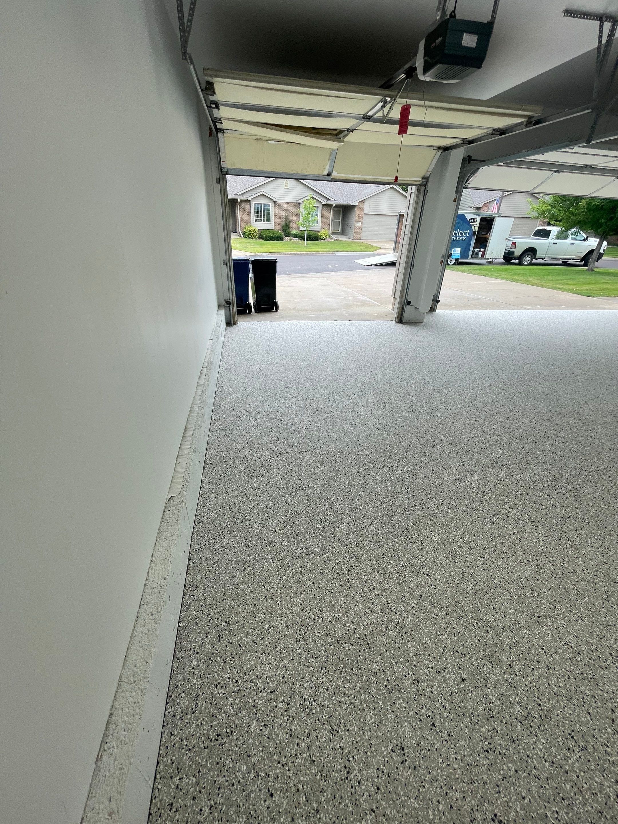 Cabin Fever Garage Floor System in Sioux Falls by Select Painting, Coatings & Garage Cabinets