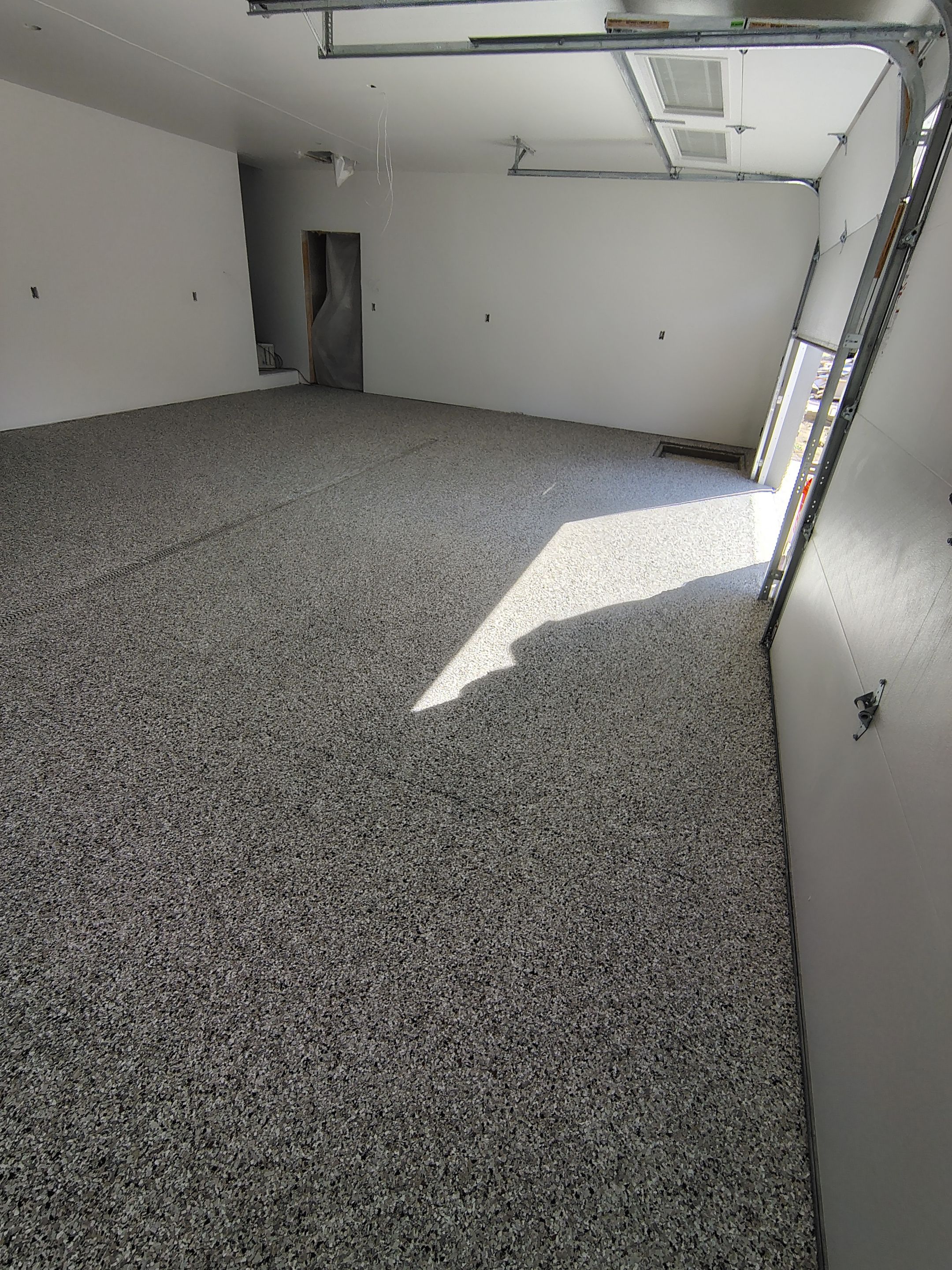 Custom Garage and Basement Epoxy Floor Coating in Menno by Select Painting, Coatings & Garage Cabinets