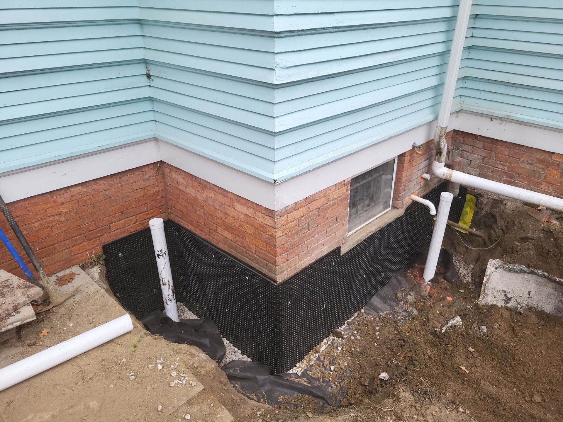 Exterior Basement Waterproofing & Combo Sump Backup System by Toledo Basement Repair