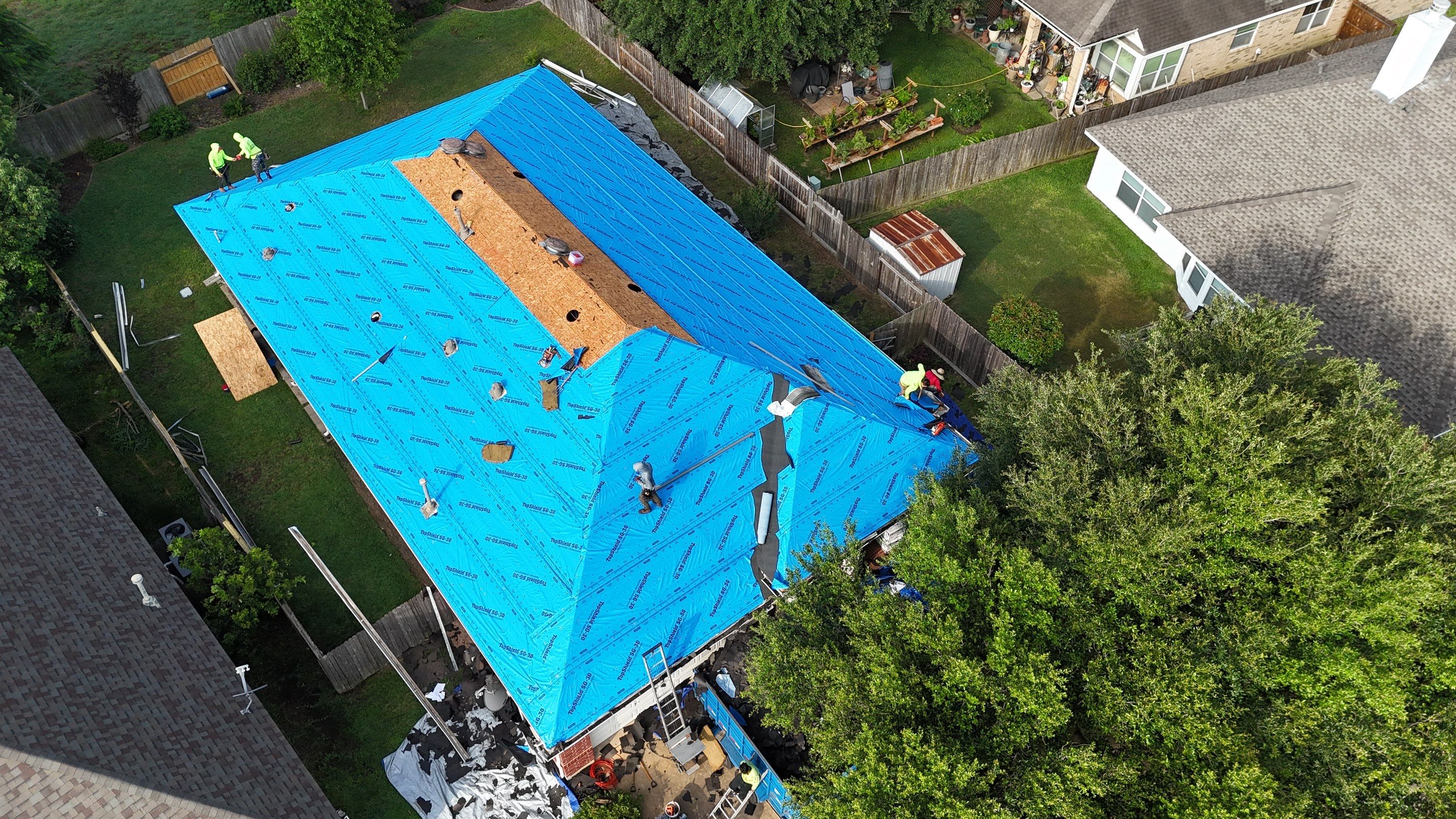 Residential Roofing & Gutter Installation using IKO Dynasty by Core Four Roofing