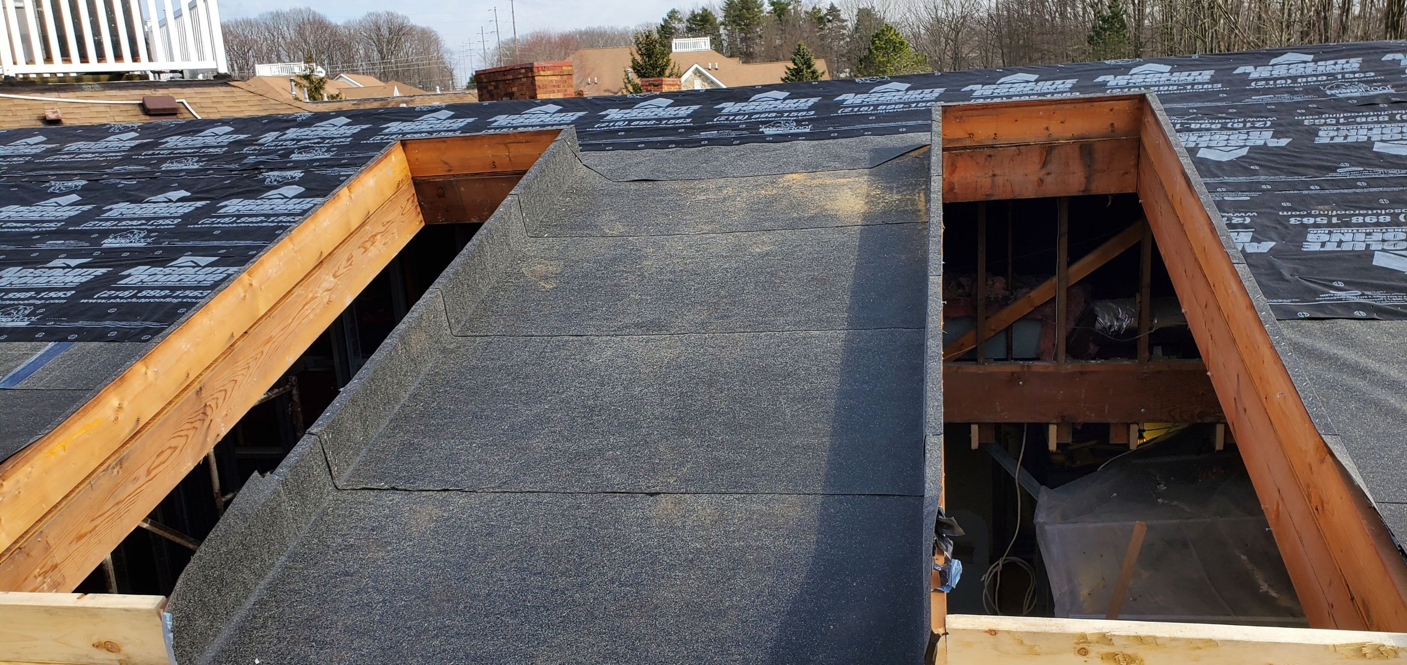 Skylight removal and install  by Absolute Roofing and Construction