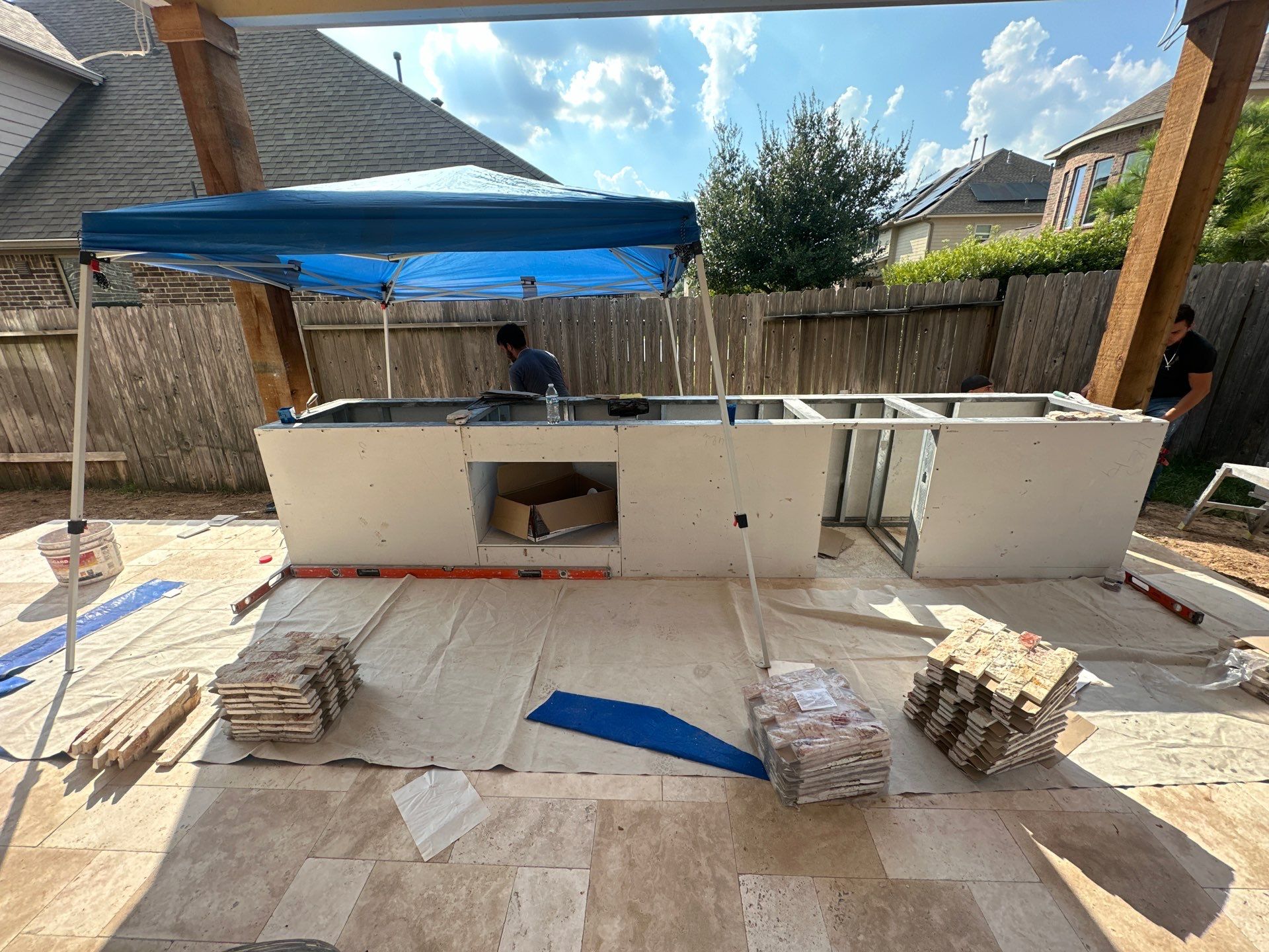 Covered Patio and Summer Kitchen in Spring,  TX by SophAlx LLC