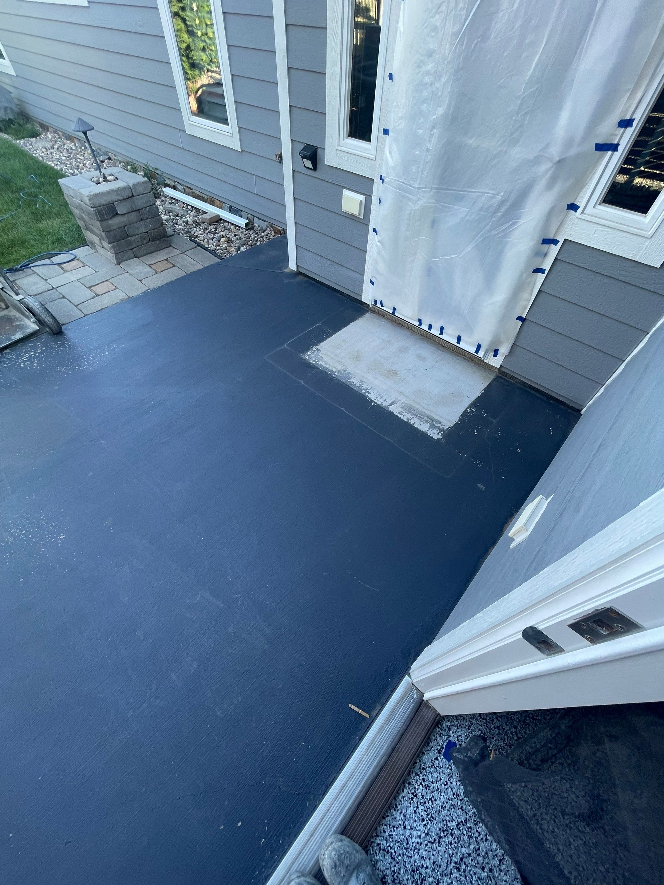 Concrete Patio Coating with Fuzzy Wool Finish in Sioux Falls by Select Painting, Coatings & Garage Cabinets