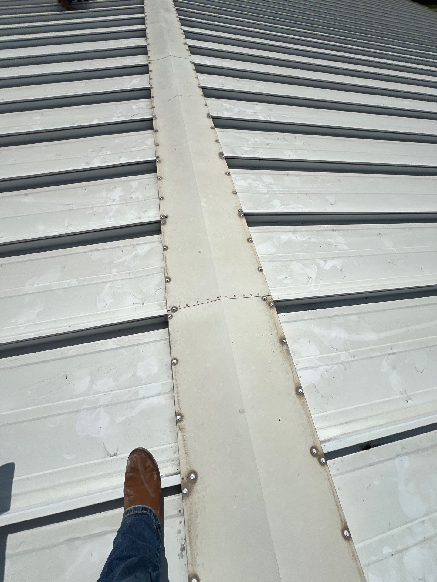 Commercial Roofing Repair using Metal by Roof Repair Company