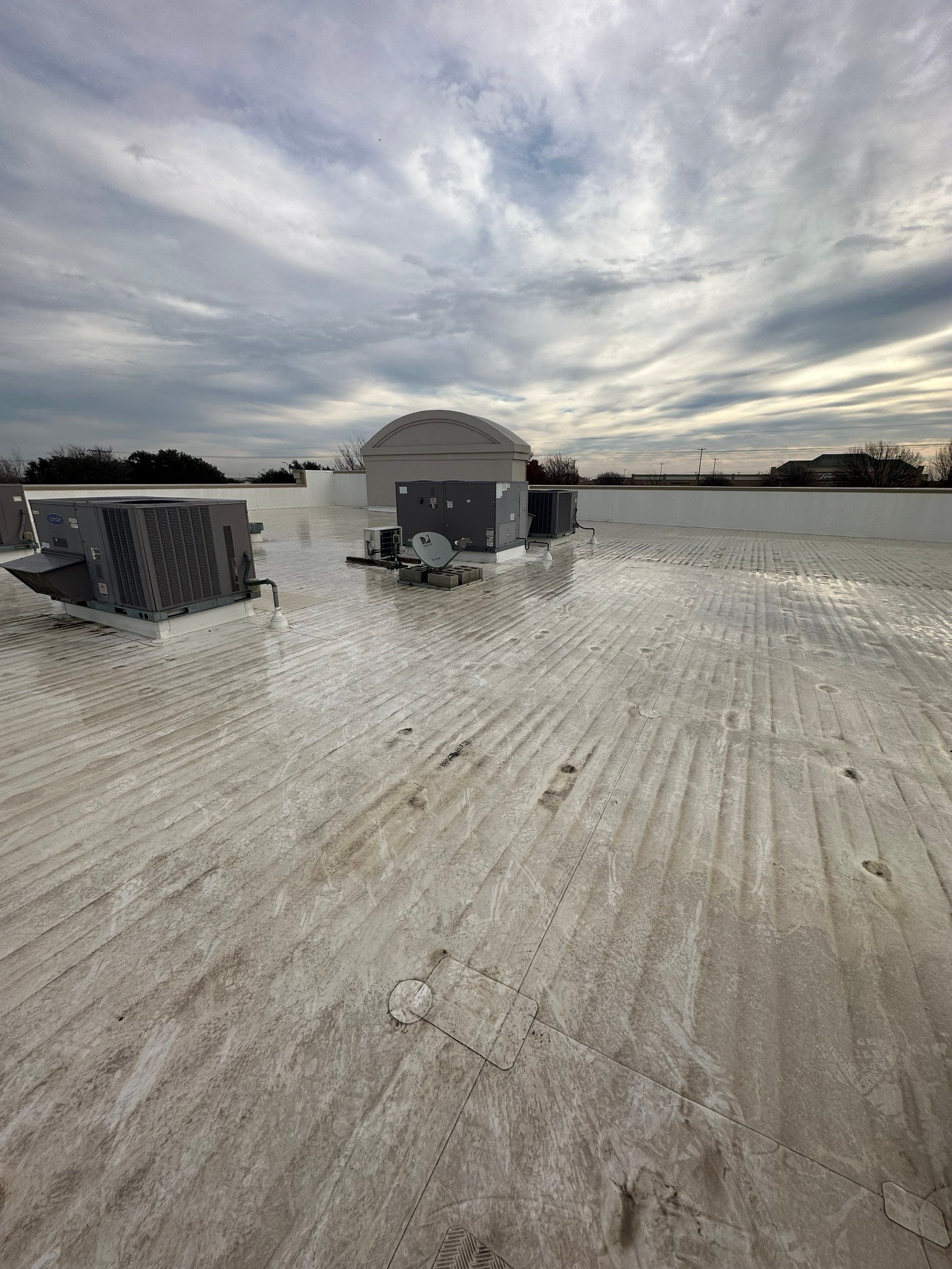 Commercial Roofing Repair using Re-Seal Pipe Flashing by OneSource Roofing and Restoration