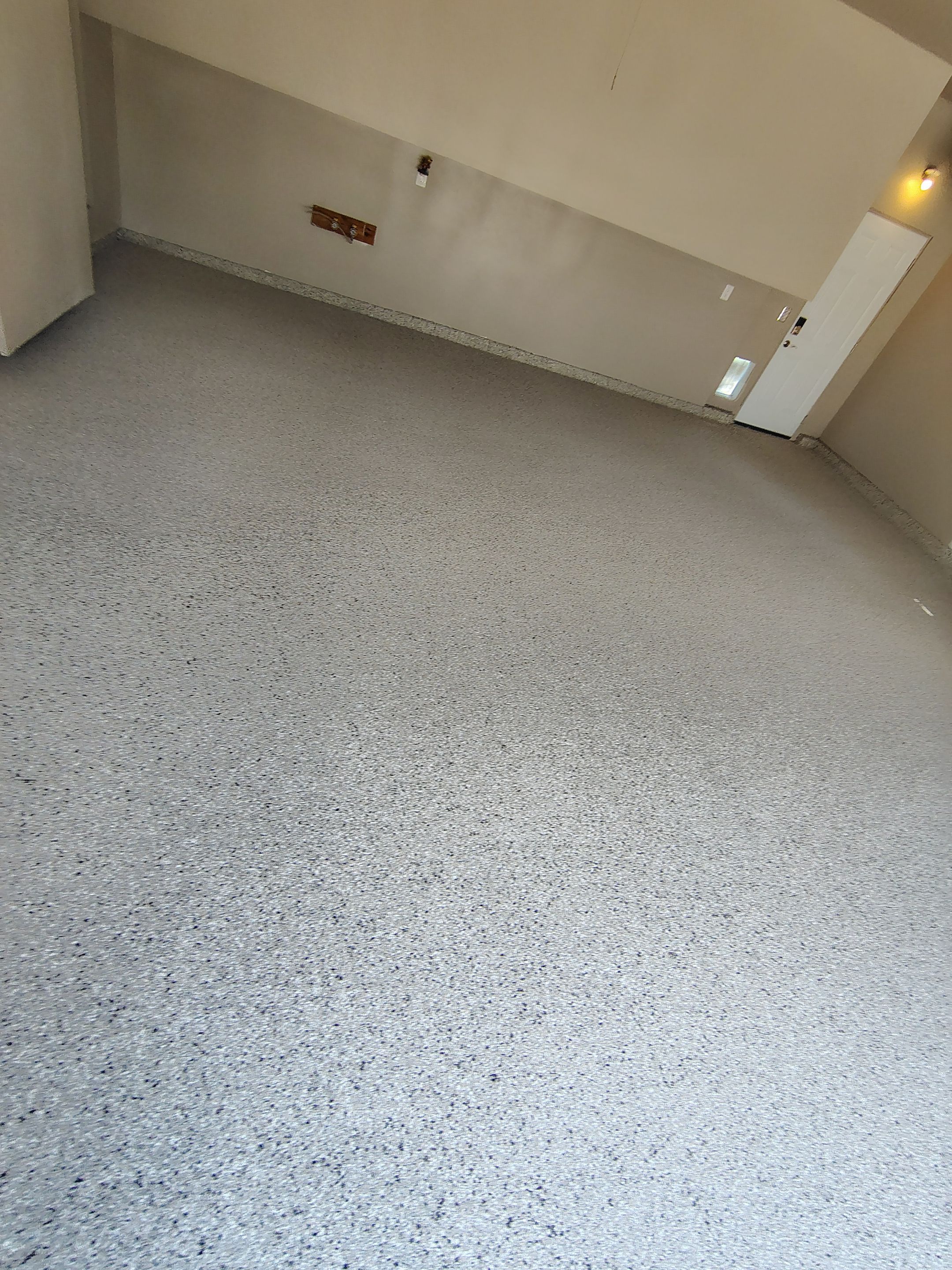 Garage Floor Coating with Decorative Flakes in Tea by Select Painting, Coatings & Garage Cabinets
