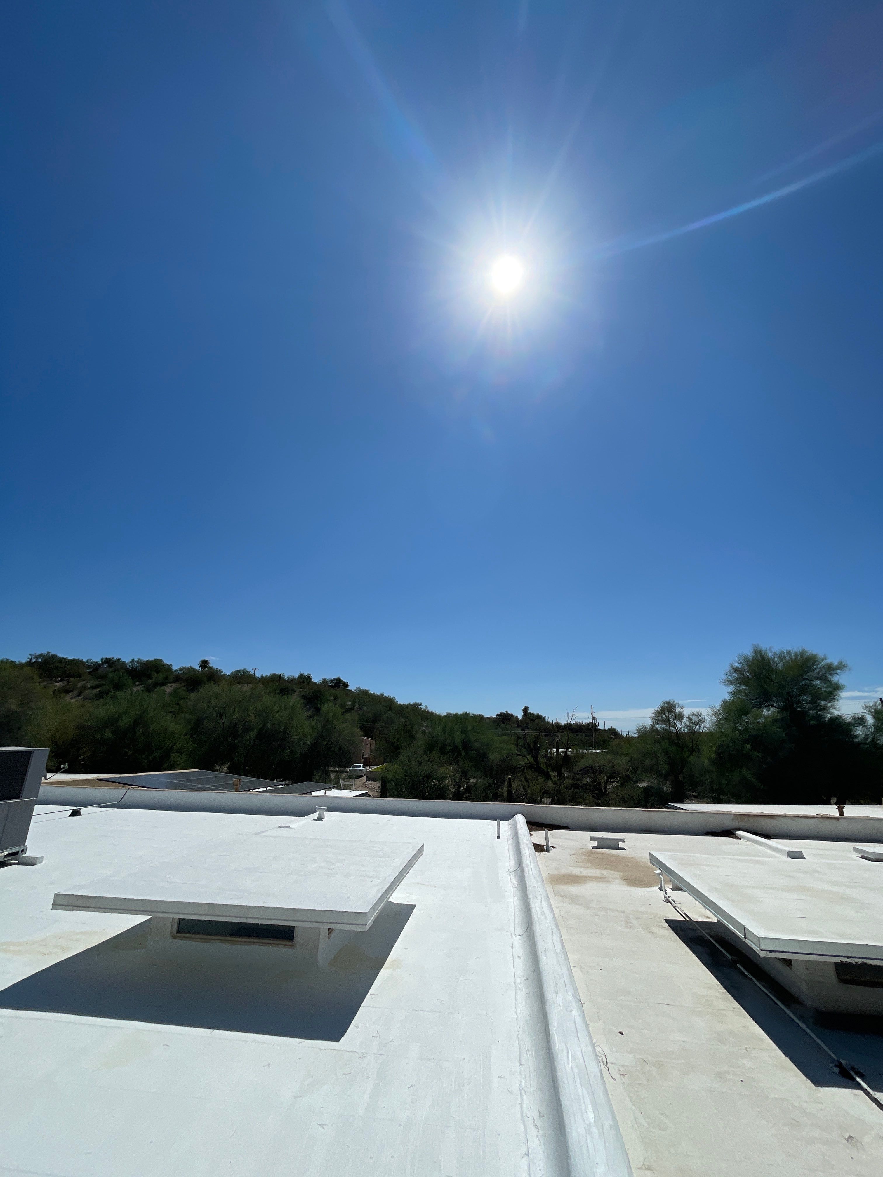 Tucson Residential Low Slope Roof Restoration and Solar Installation by West Coast Roofing AZ