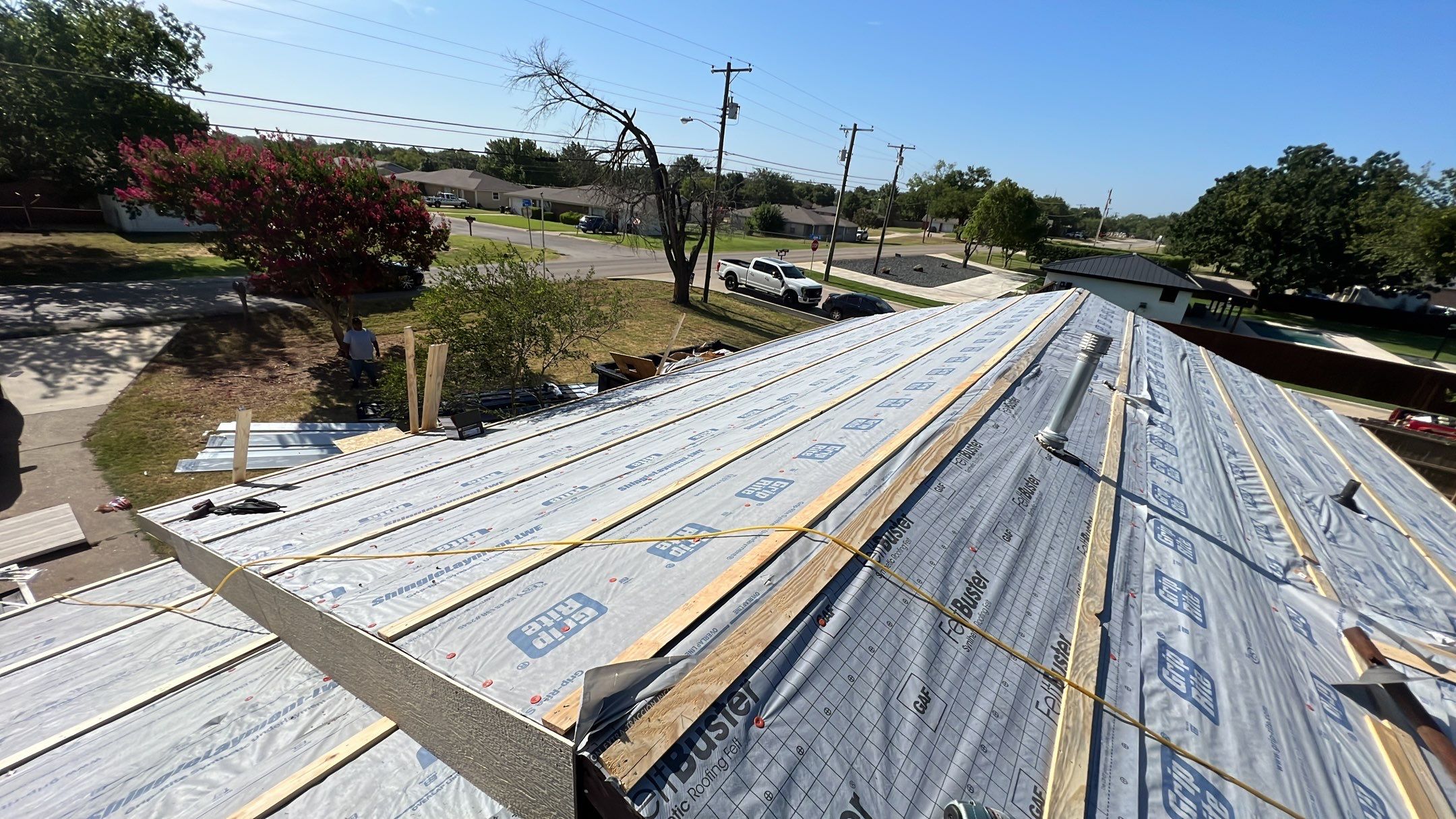 Residential Roofing Installation using PBR Metal Roof by Harvey Roofing & Construction